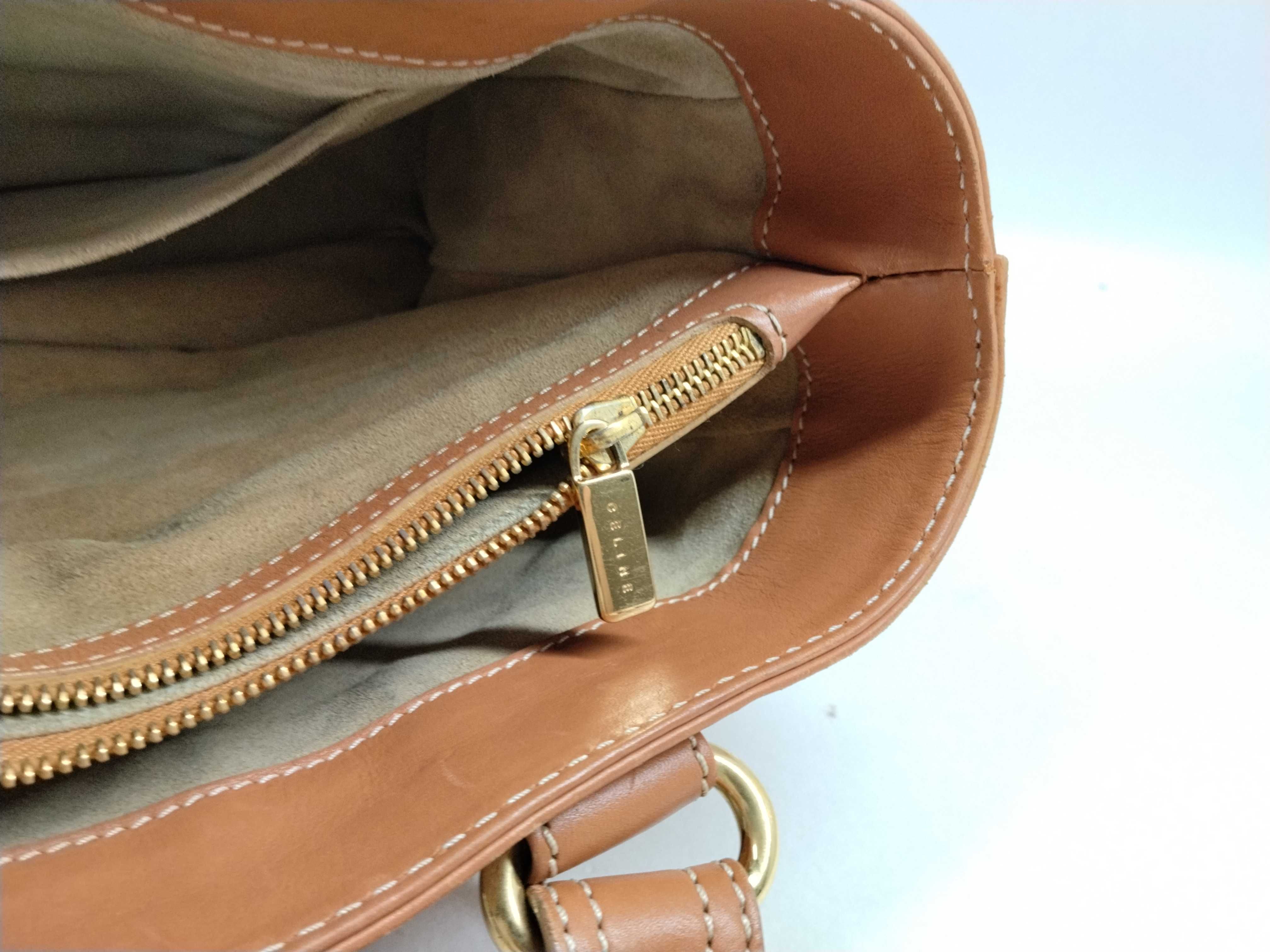 brown handbag — view 13