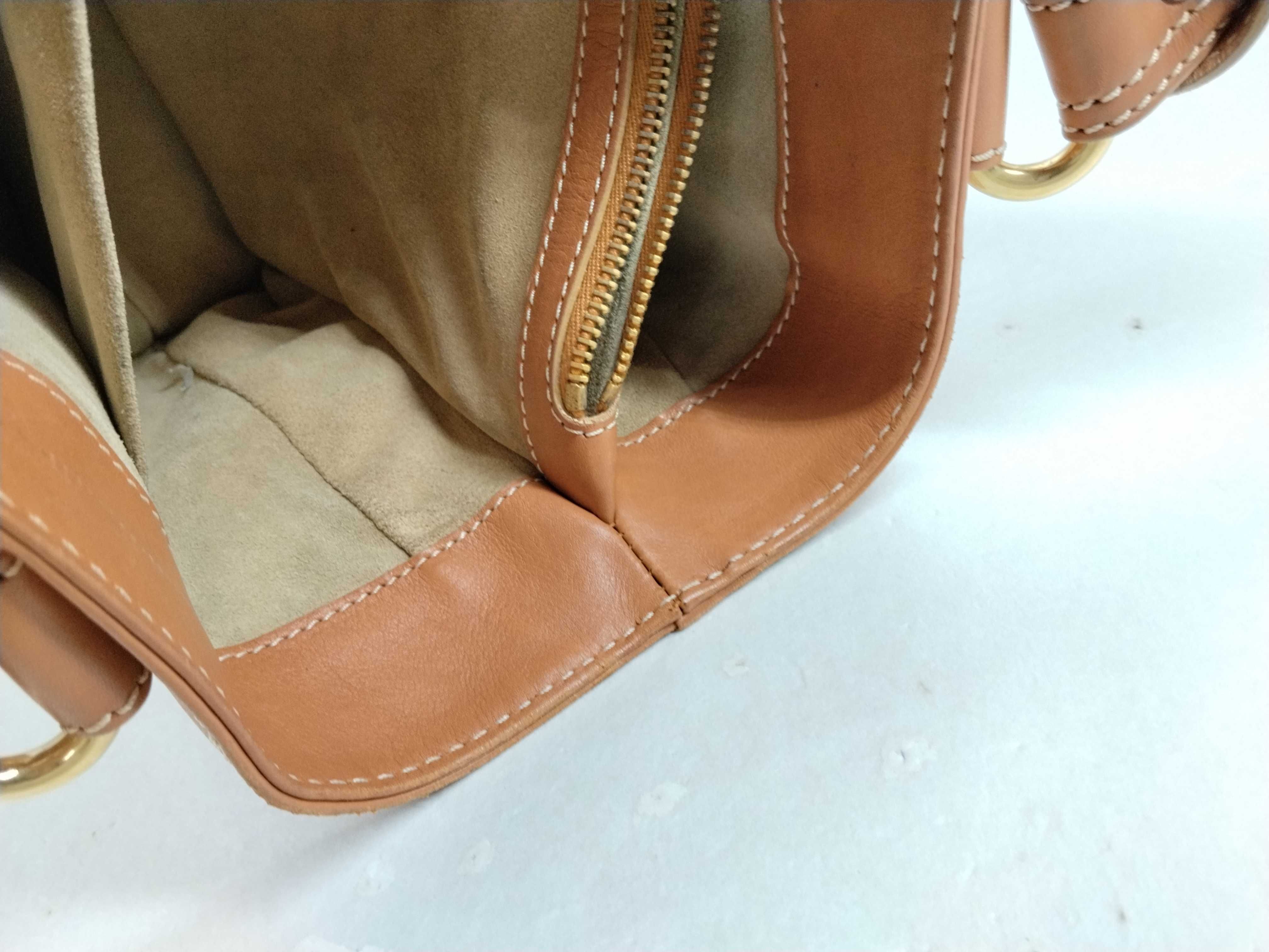 brown handbag — view 14