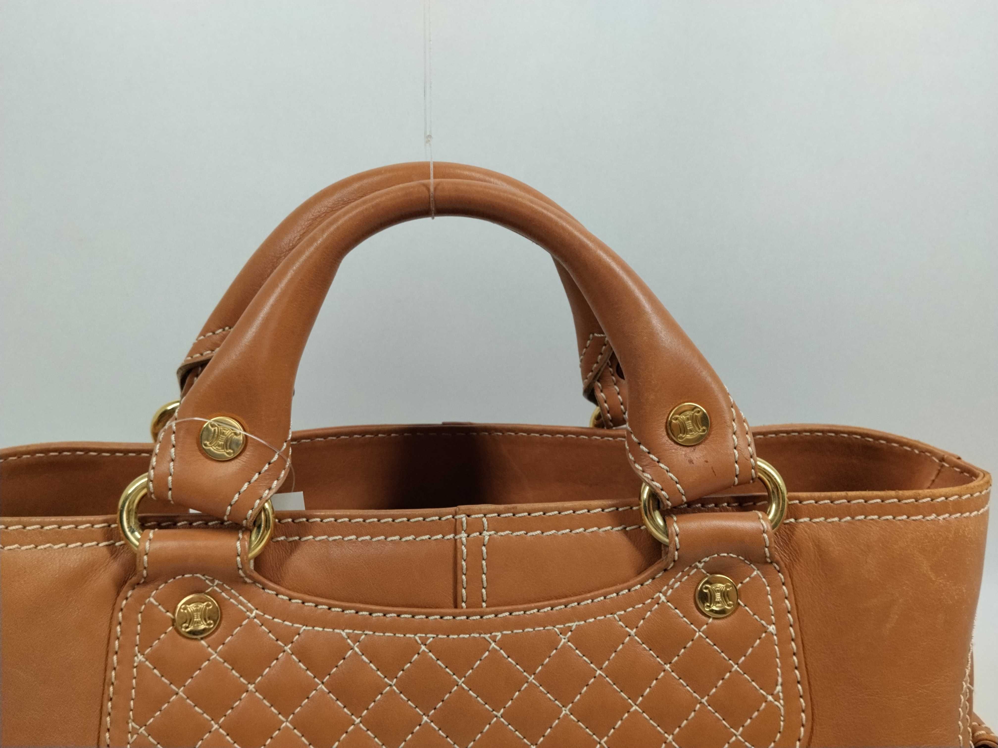 brown handbag — view 4