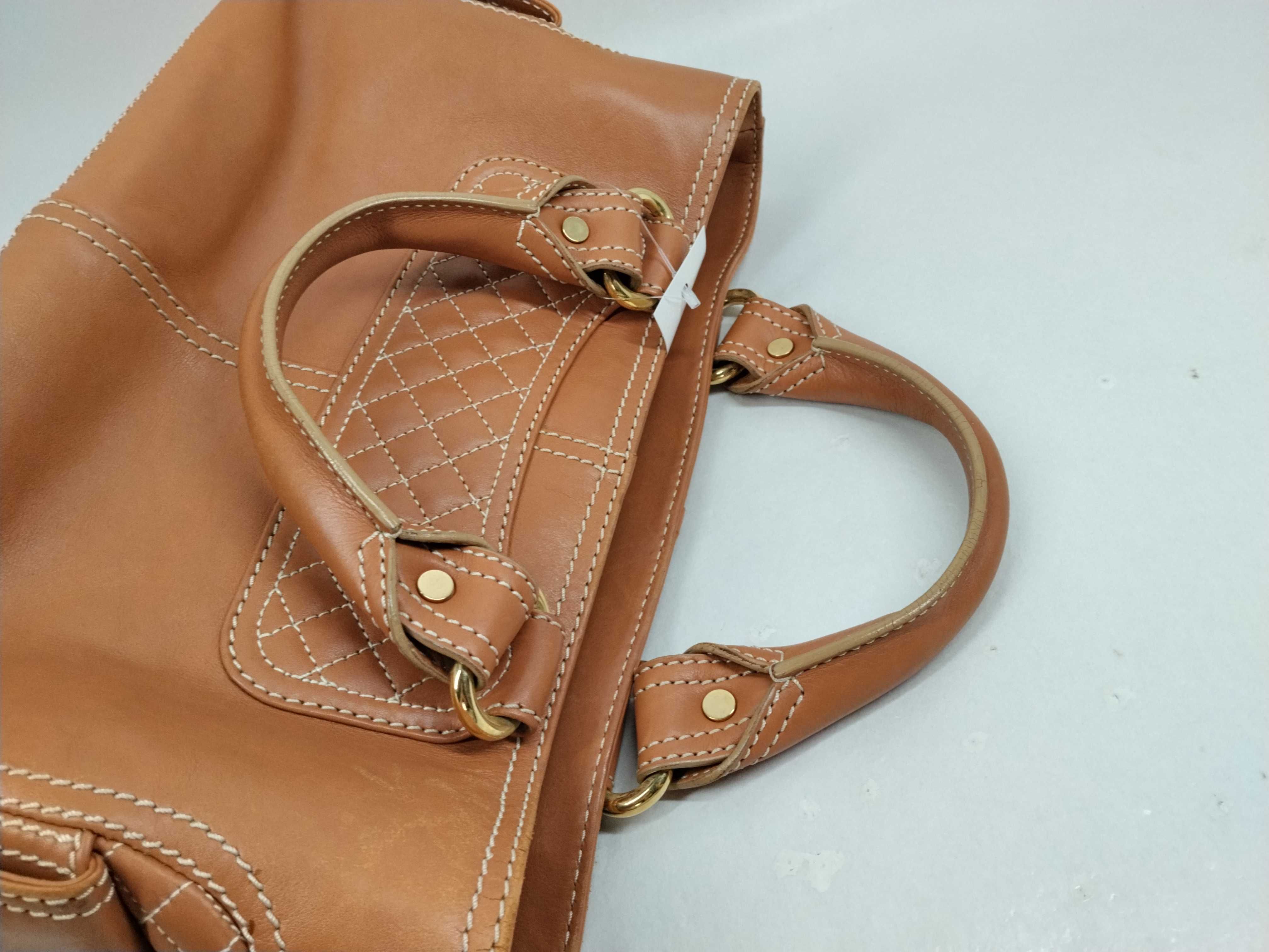 brown handbag — view 7