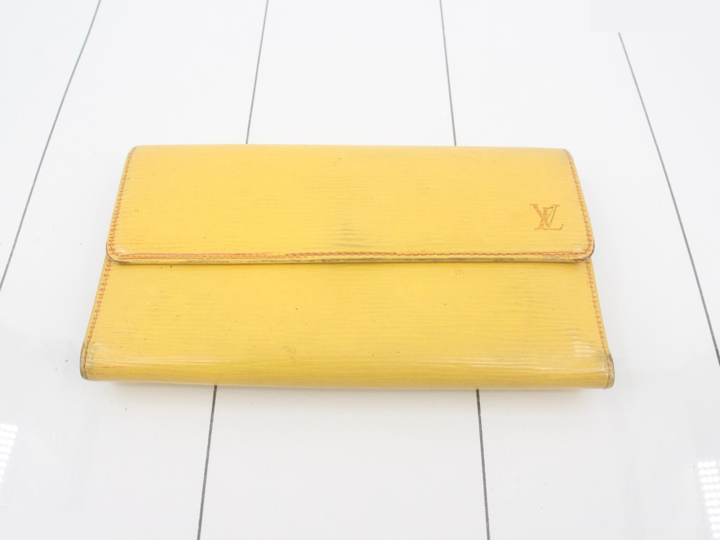 Three Epi leather wallets, two Portefeuille Billet Cartes Crédits, and other items. — view 3
