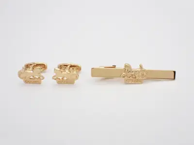 Other lines: Precious metals, cufflinks, tie clips