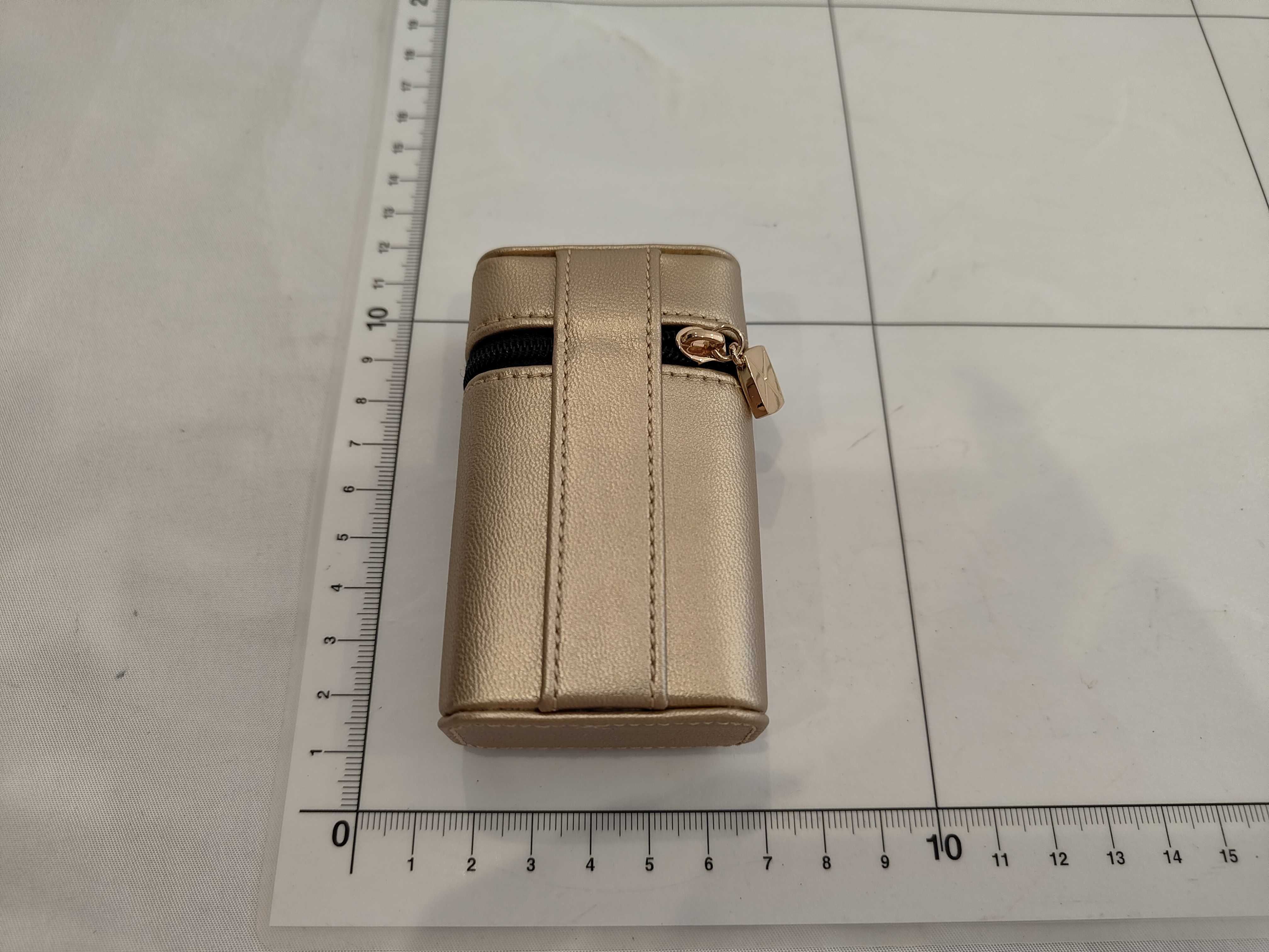 Rouge Allure lipstick with accompanying pouch and other accessories — view 2