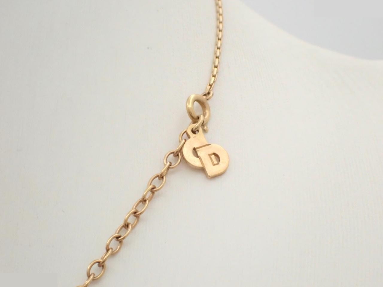 Gold necklace with stone, chain approximately 42cm long. — view 2