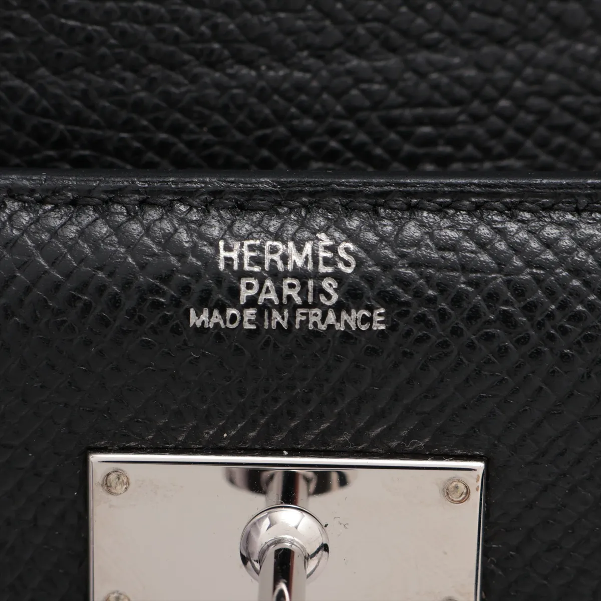 Kelly Wallet Medium, Veau Epsom, Compact Wallet, Black with Silver Hardware L: 2008. Slight lifting at the base of the zipper pull. — view 7