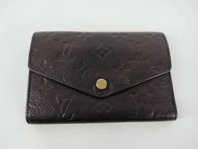 Monogram Empreinte Curieuse Bi-fold Wallet