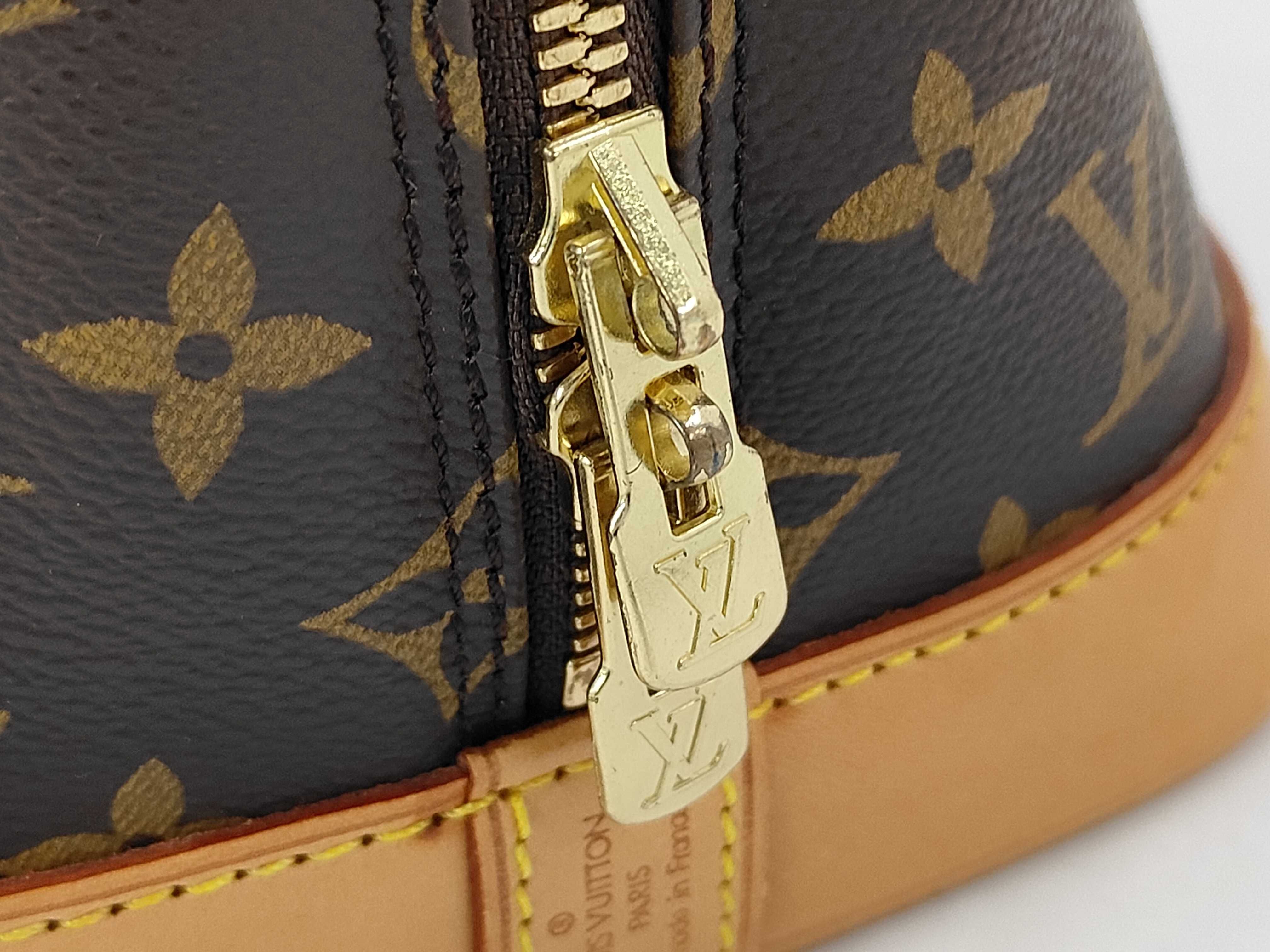 Monogram Vuitton M51130 Alma Handbag Monogram Canvas Brown Handbag — view 10