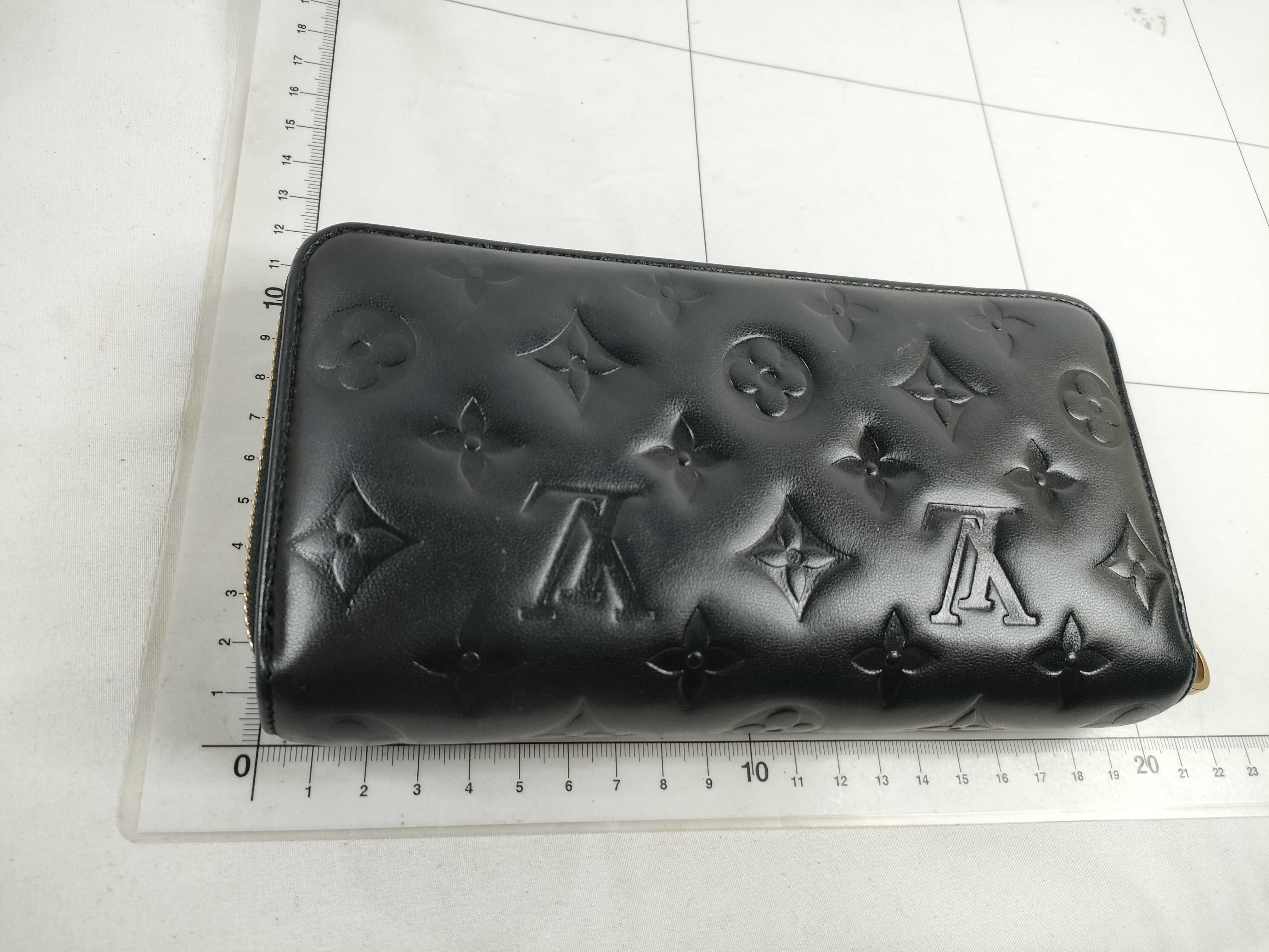 Monogram Embossed Noir Zippy Wallet M81510 — view 2
