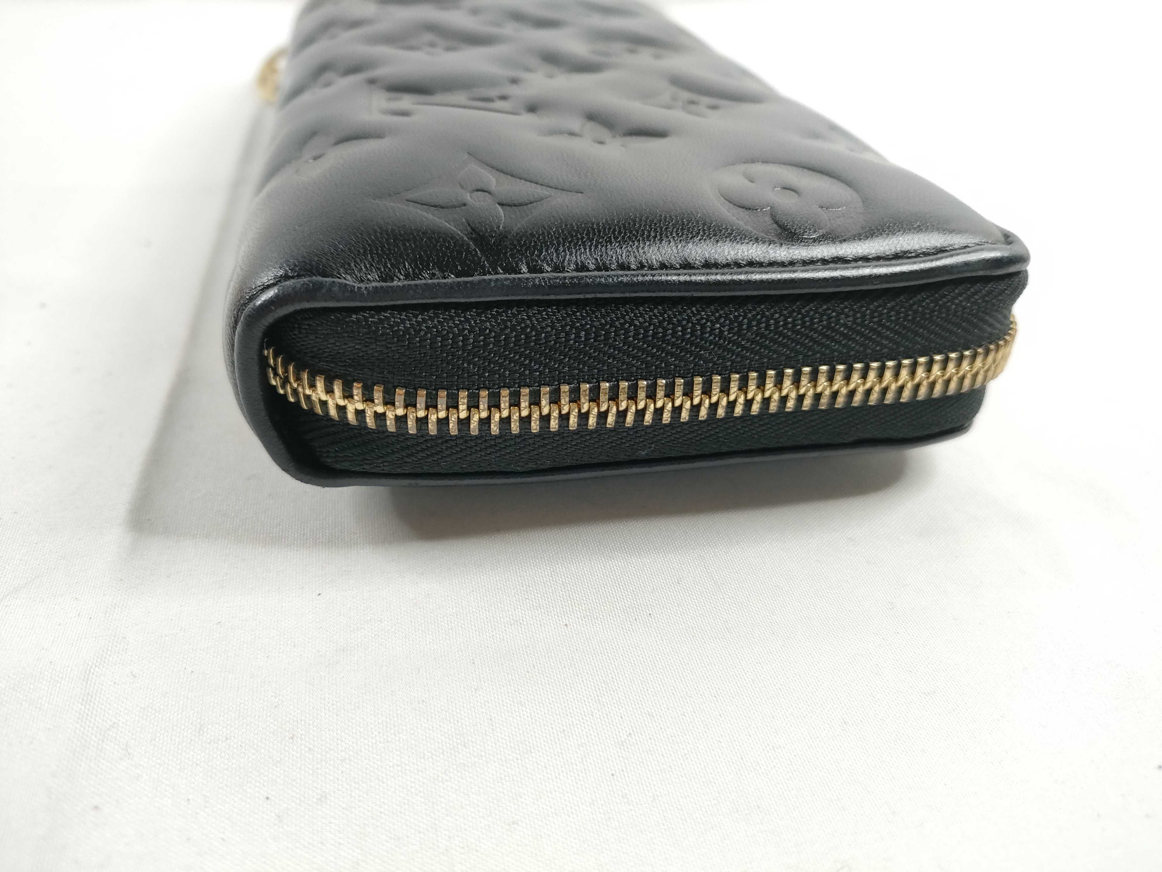 Monogram Embossed Noir Zippy Wallet M81510 — view 7