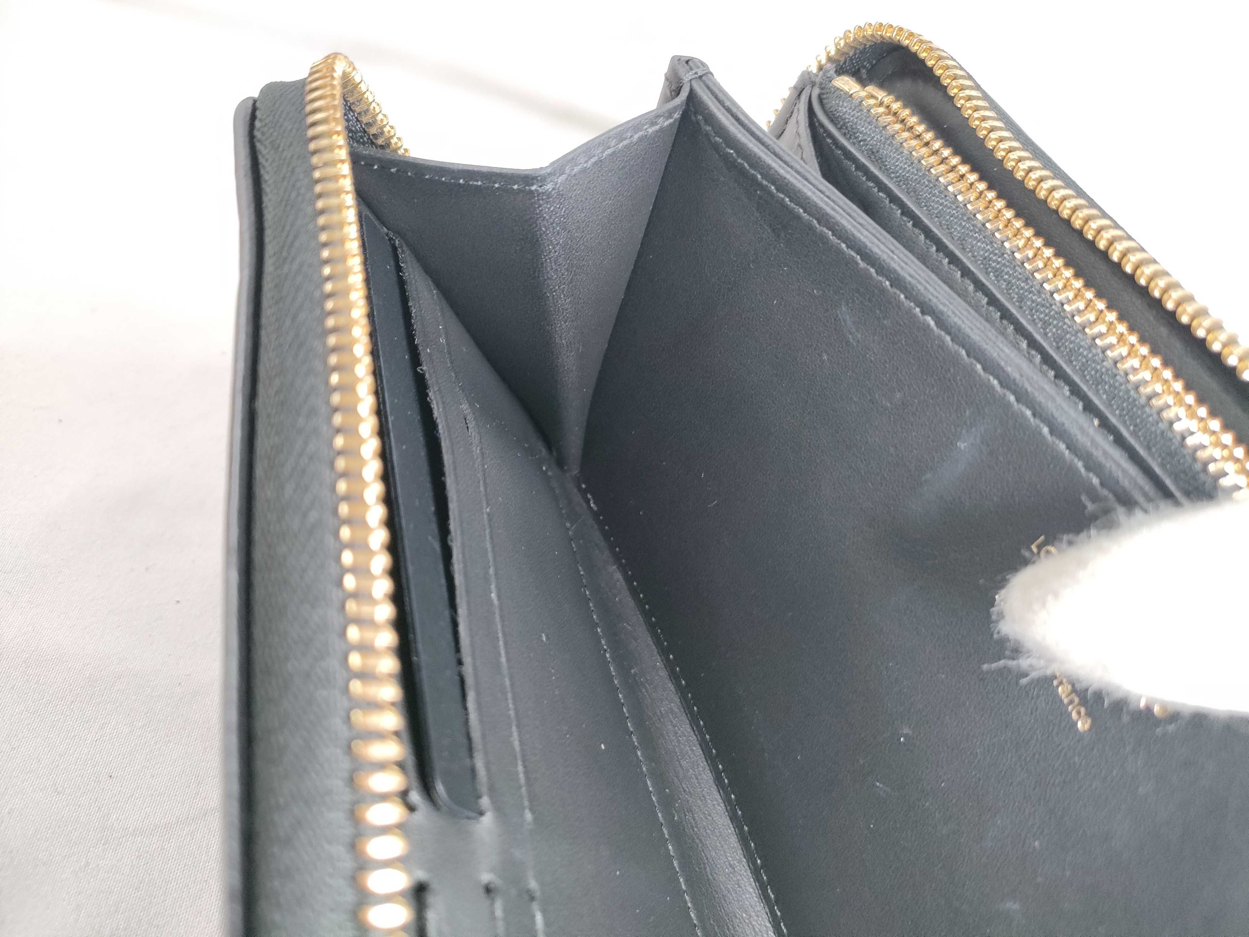 Monogram Embossed Noir Zippy Wallet M81510 — view 9