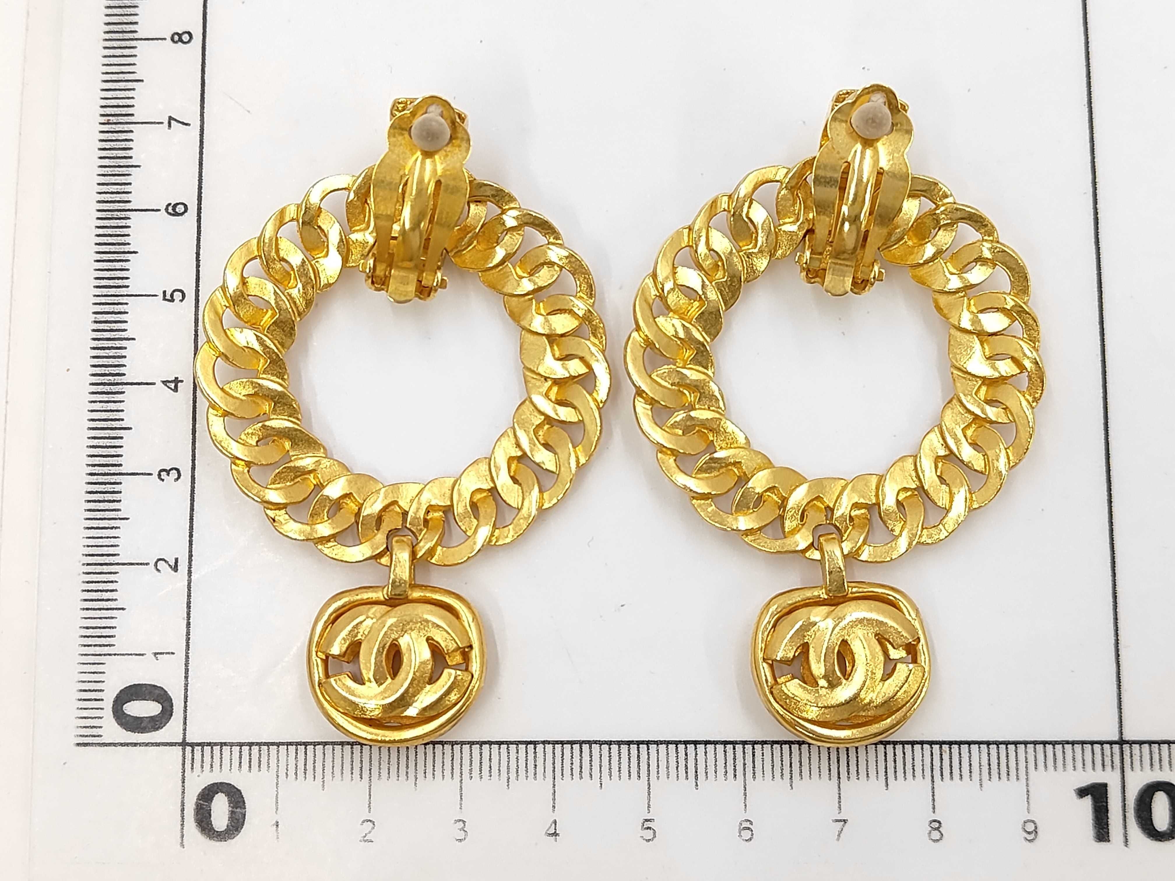 hoop earrings with Coco Mark and box. — view 2