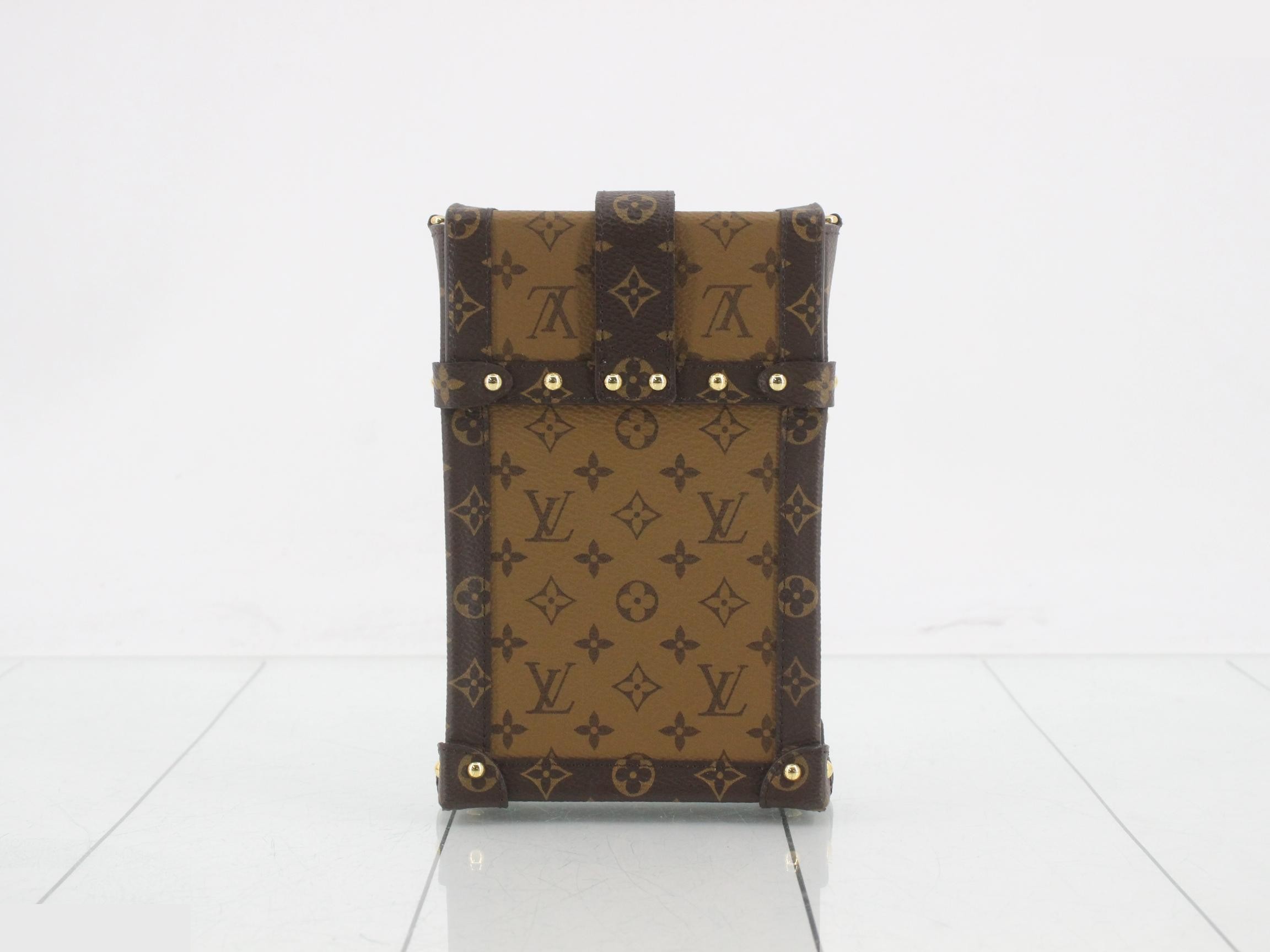 Pochette Trunk Vertical Monogram Reverse, with protective seal, unused. — view 2