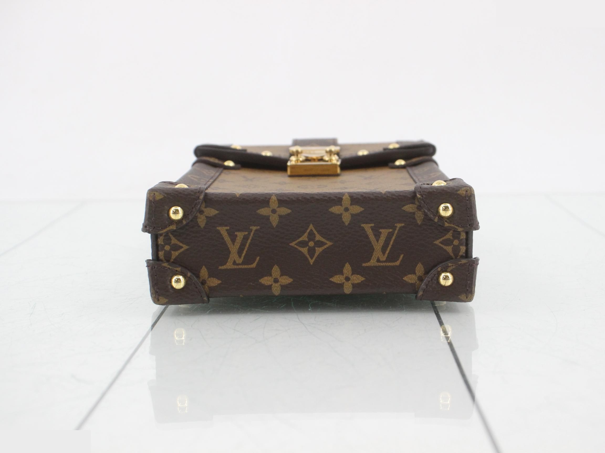 Pochette Trunk Vertical Monogram Reverse, with protective seal, unused. — view 3