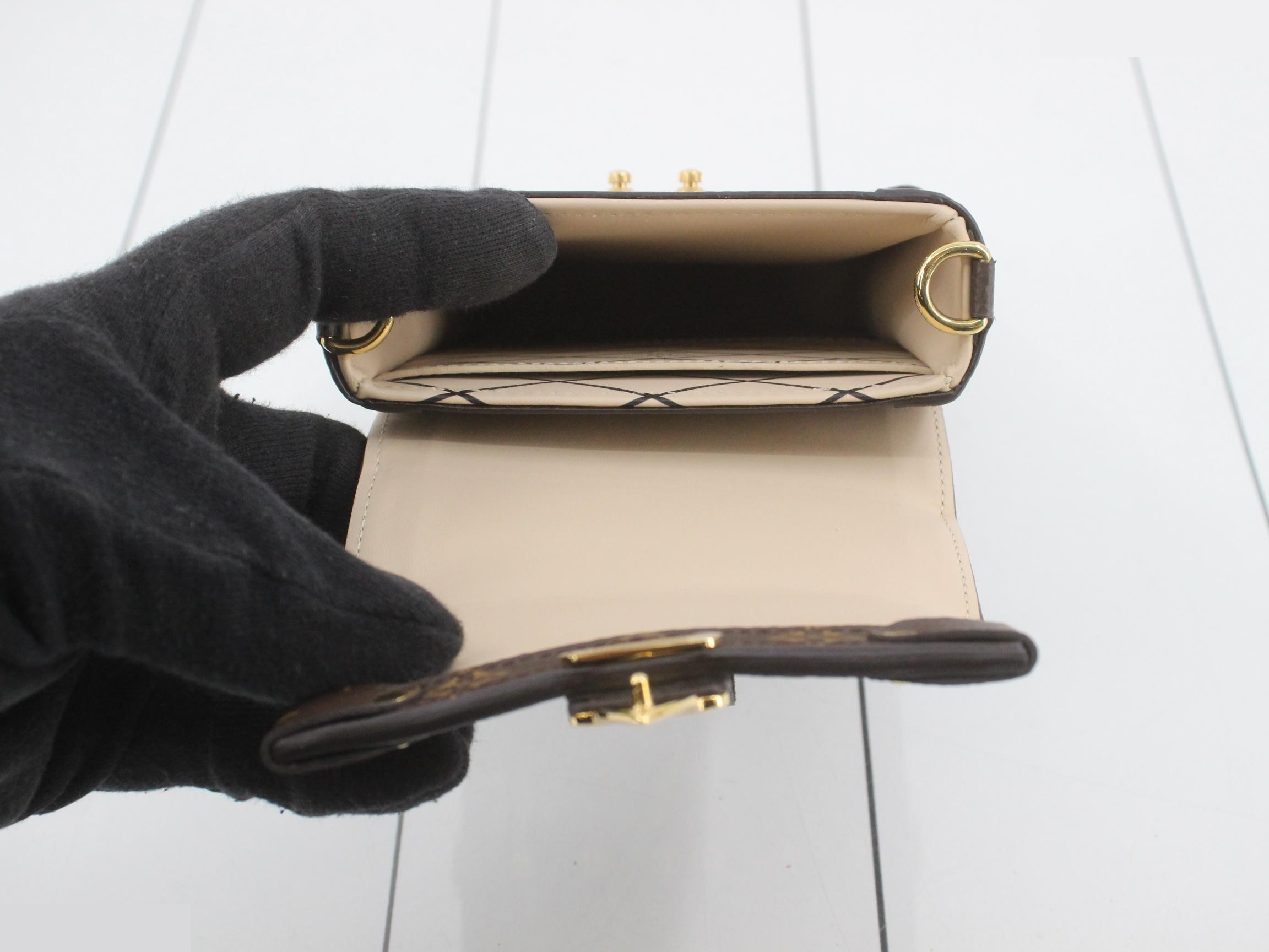 Pochette Trunk Vertical Monogram Reverse, with protective seal, unused. — view 4