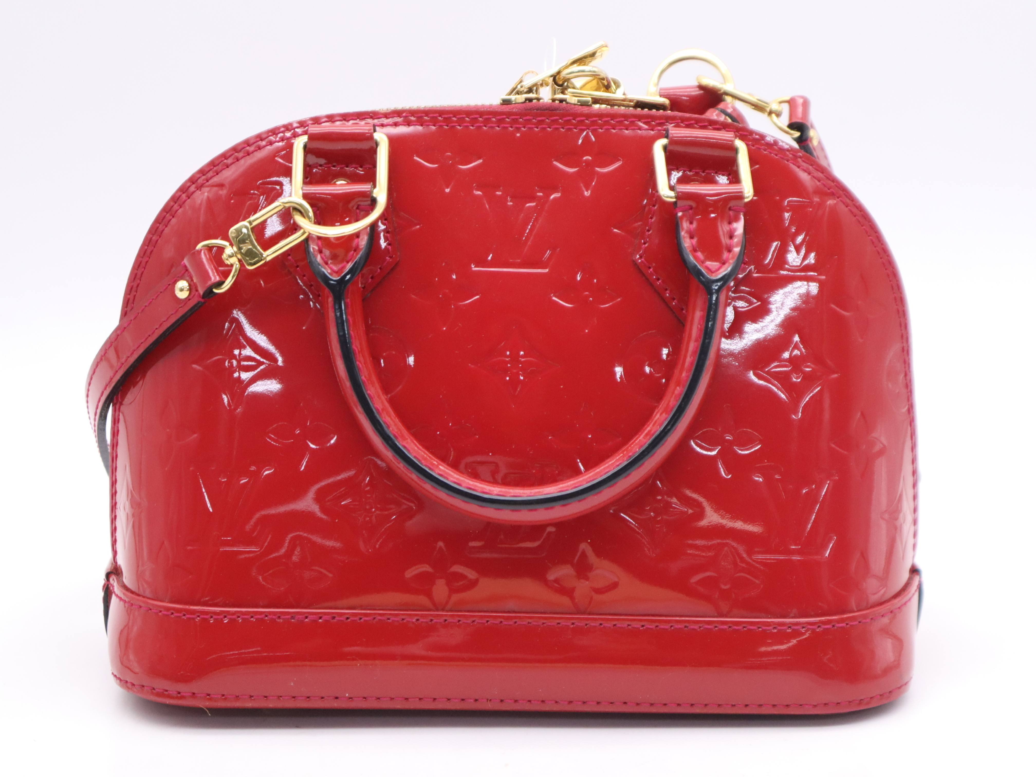 M90174 Monogram Vernis Alma BB Cerise Handbag with Shoulder Strap, Padlock, 2 Keys, Clochette, and Dust Bag — view 2