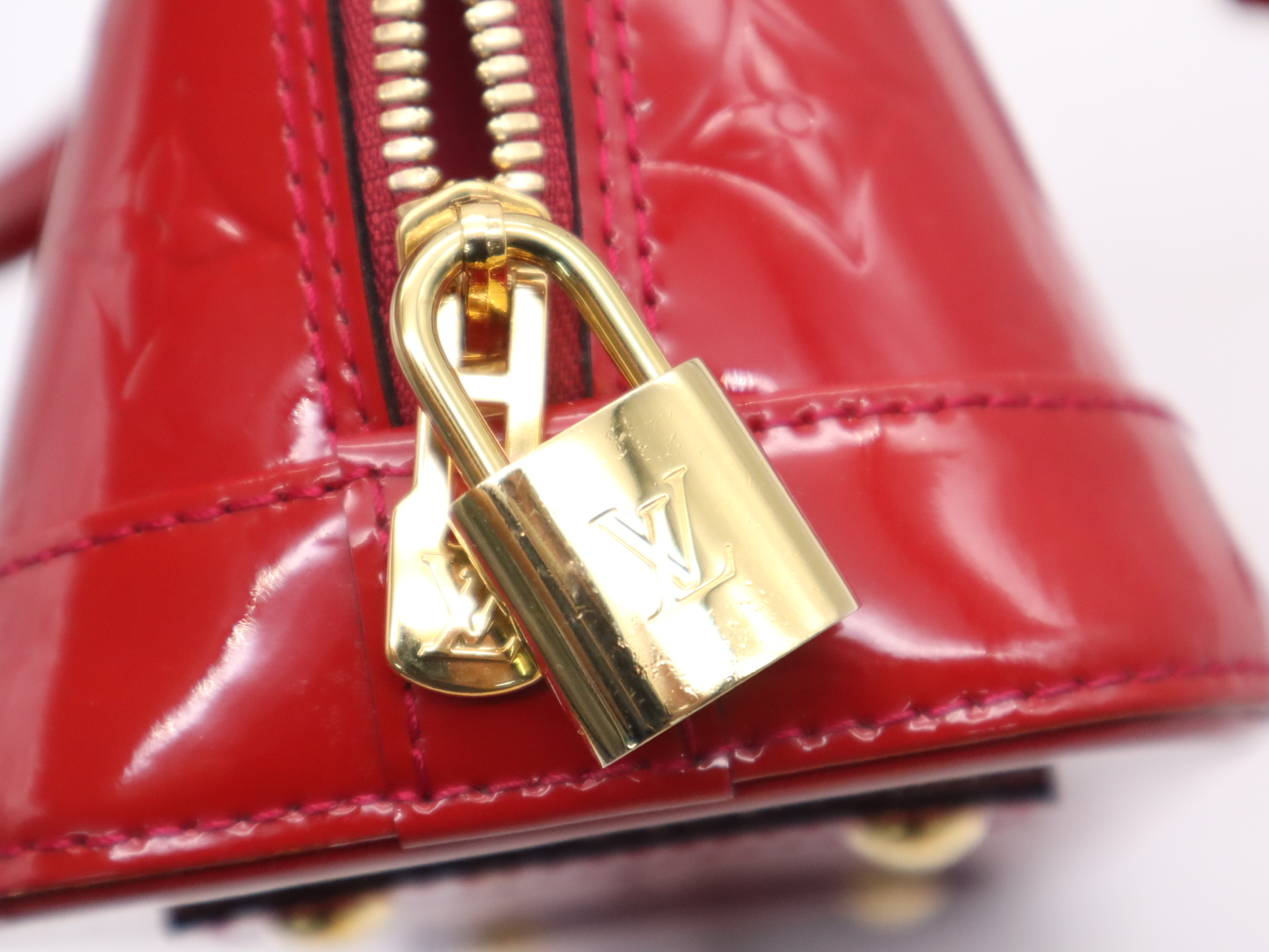 M90174 Monogram Vernis Alma BB Cerise Handbag with Shoulder Strap, Padlock, 2 Keys, Clochette, and Dust Bag — view 14