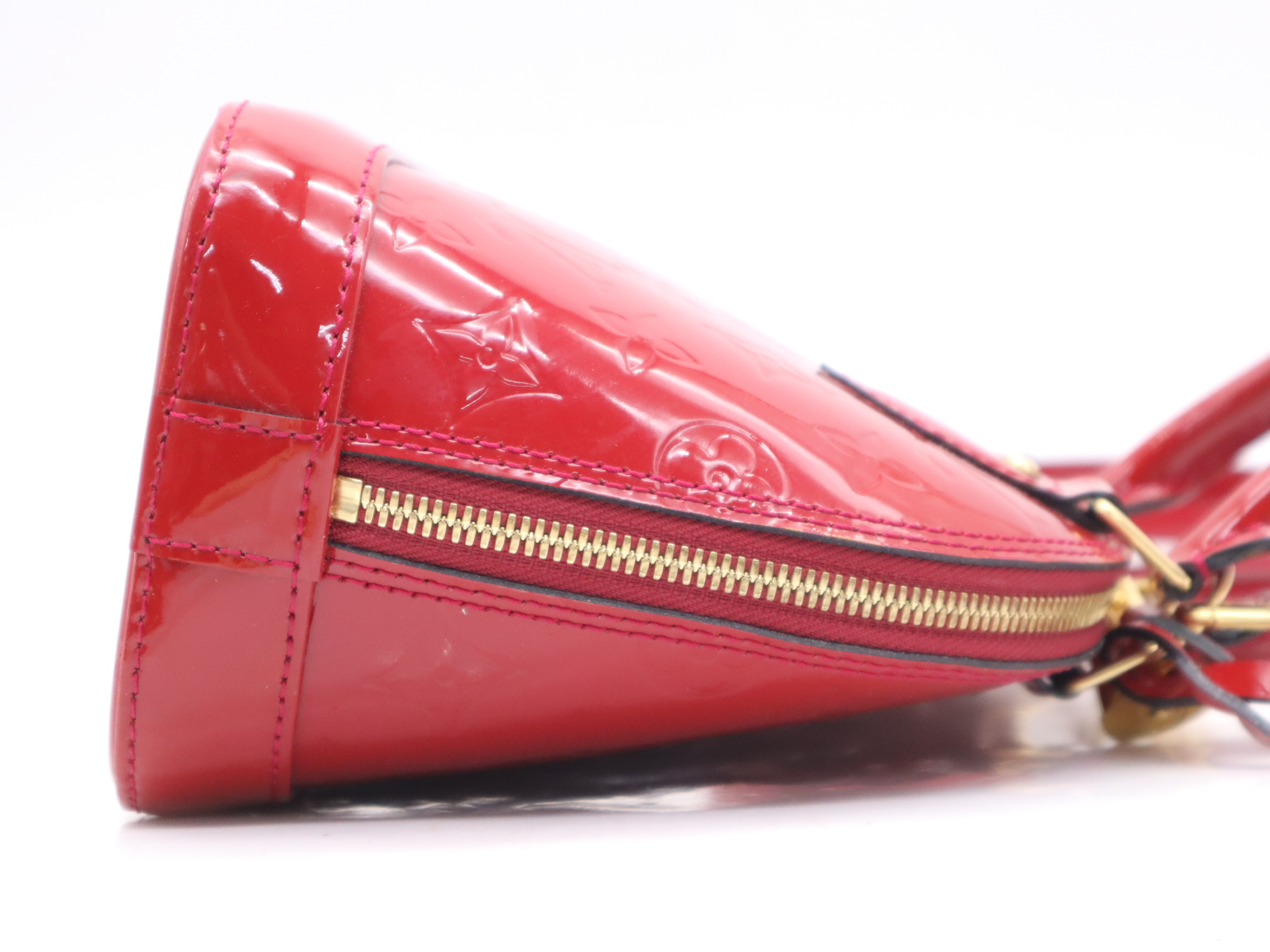 M90174 Monogram Vernis Alma BB Cerise Handbag with Shoulder Strap, Padlock, 2 Keys, Clochette, and Dust Bag — view 5