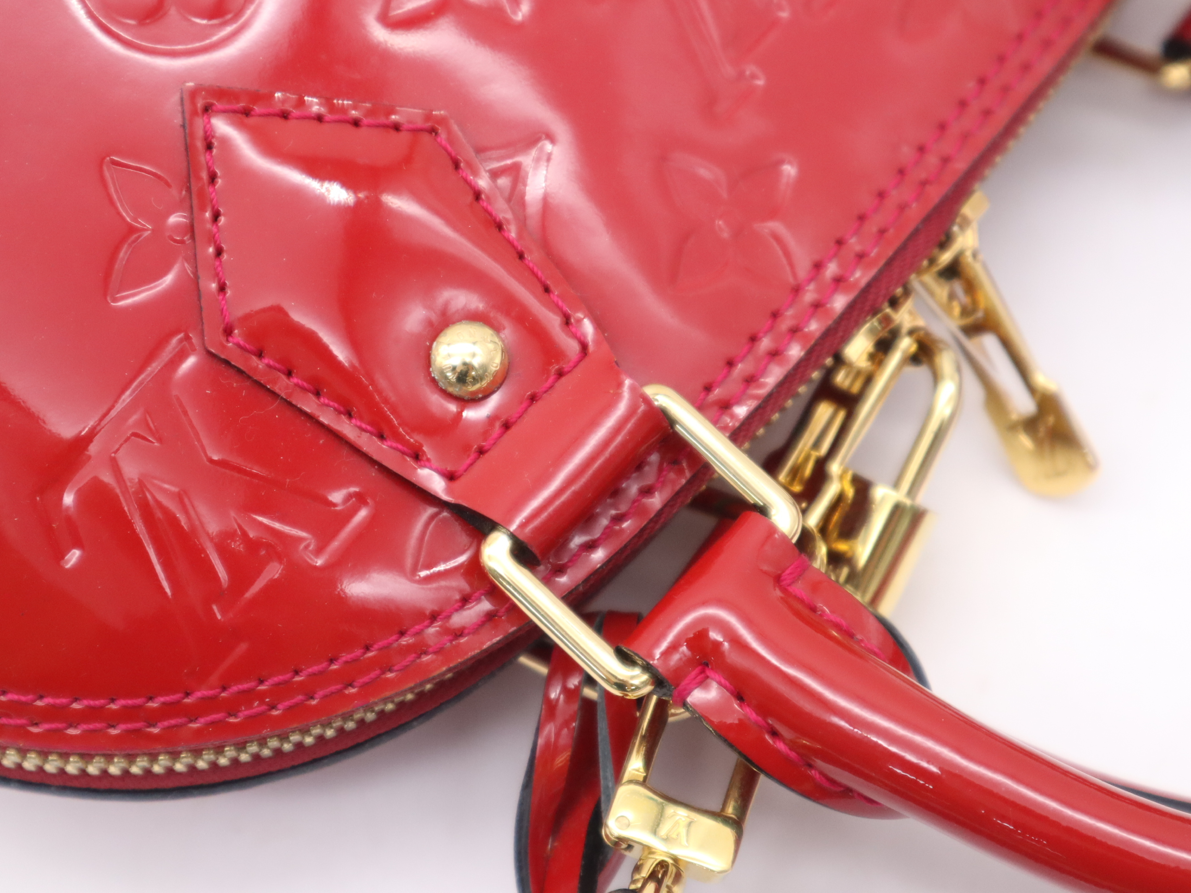 M90174 Monogram Vernis Alma BB Cerise Handbag with Shoulder Strap, Padlock, 2 Keys, Clochette, and Dust Bag — view 7