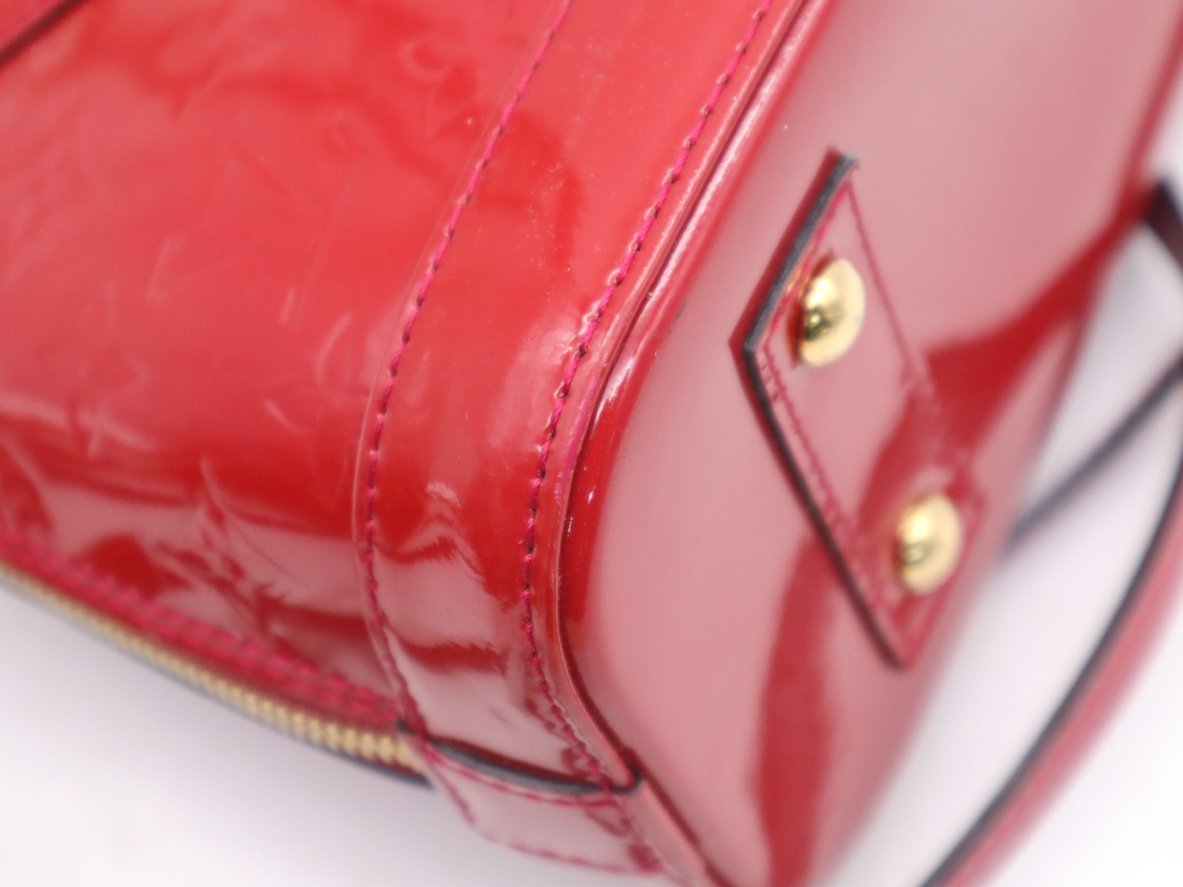 M90174 Monogram Vernis Alma BB Cerise Handbag with Shoulder Strap, Padlock, 2 Keys, Clochette, and Dust Bag — view 9