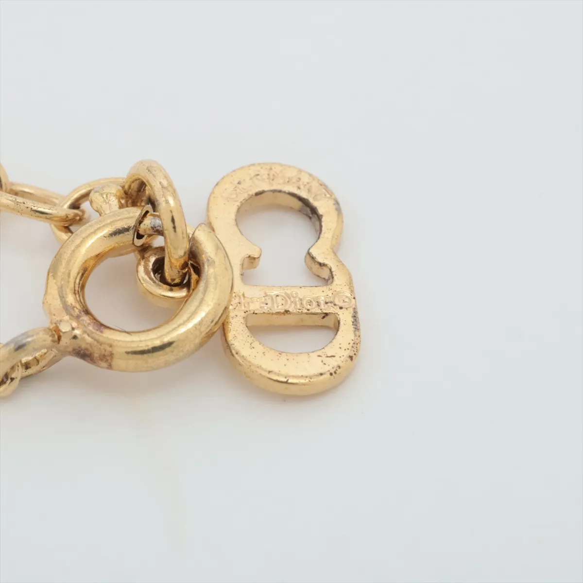 CD logo necklace, gold plated with rhinestones. Shows signs of wear, — view 4