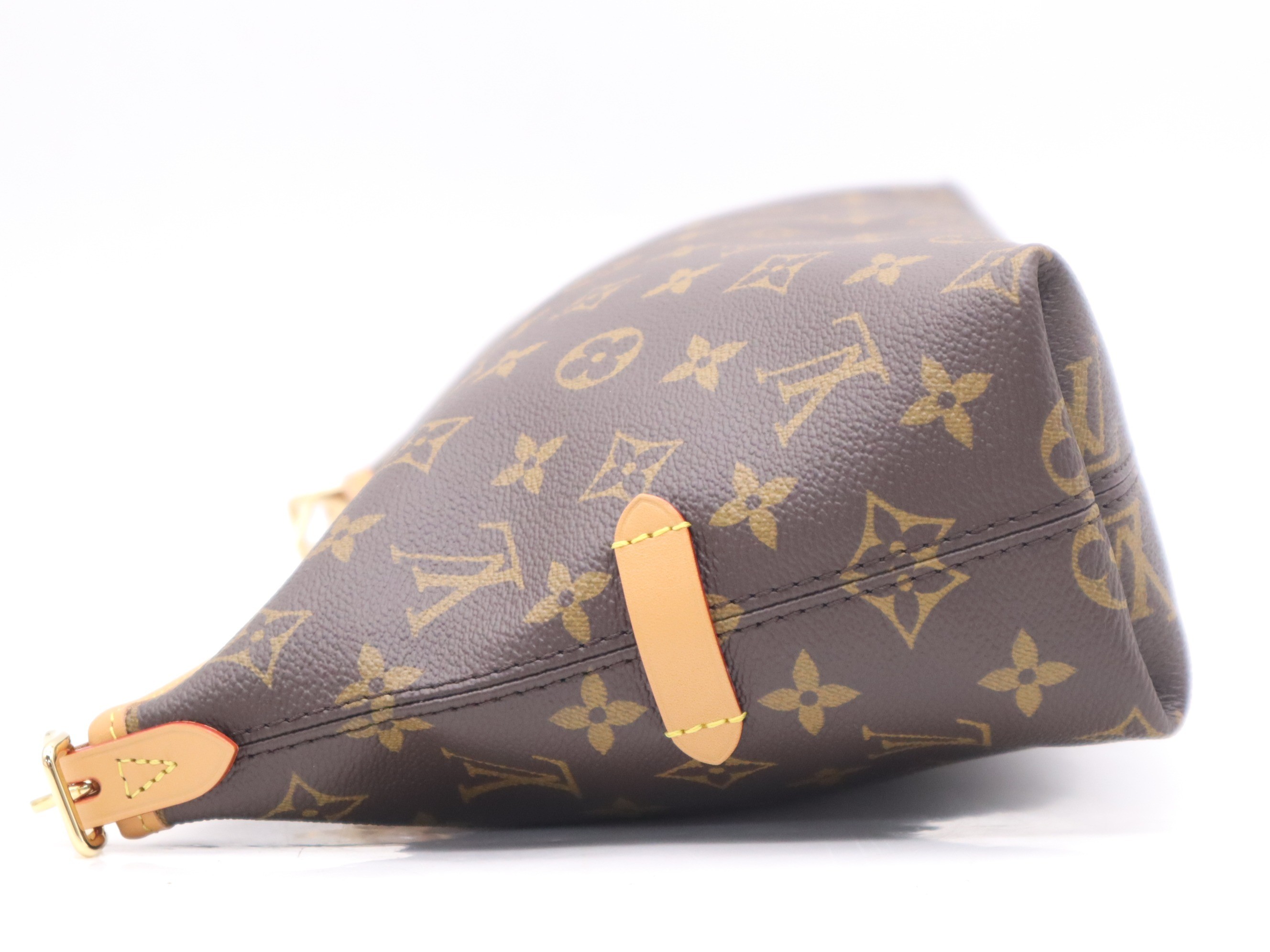 Monogram Carryall EW with shoulder strap, charm, and dust bag. — view 3