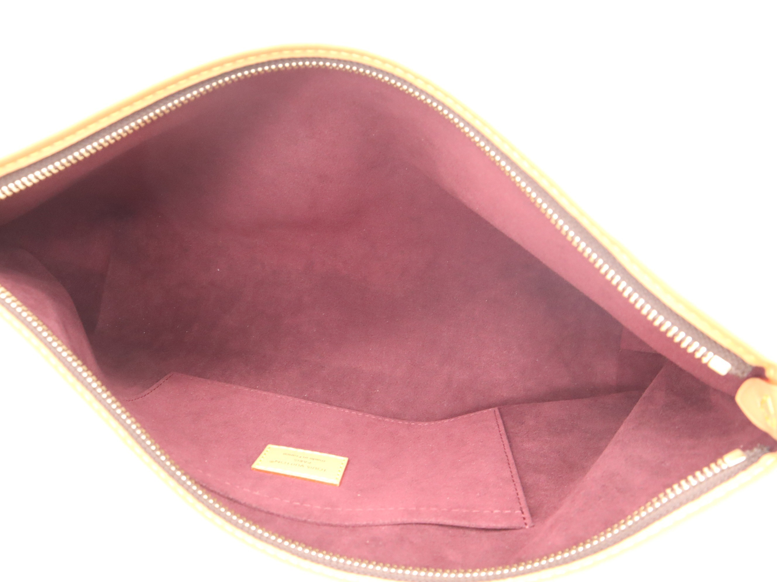 Monogram Carryall EW with shoulder strap, charm, and dust bag. — view 6