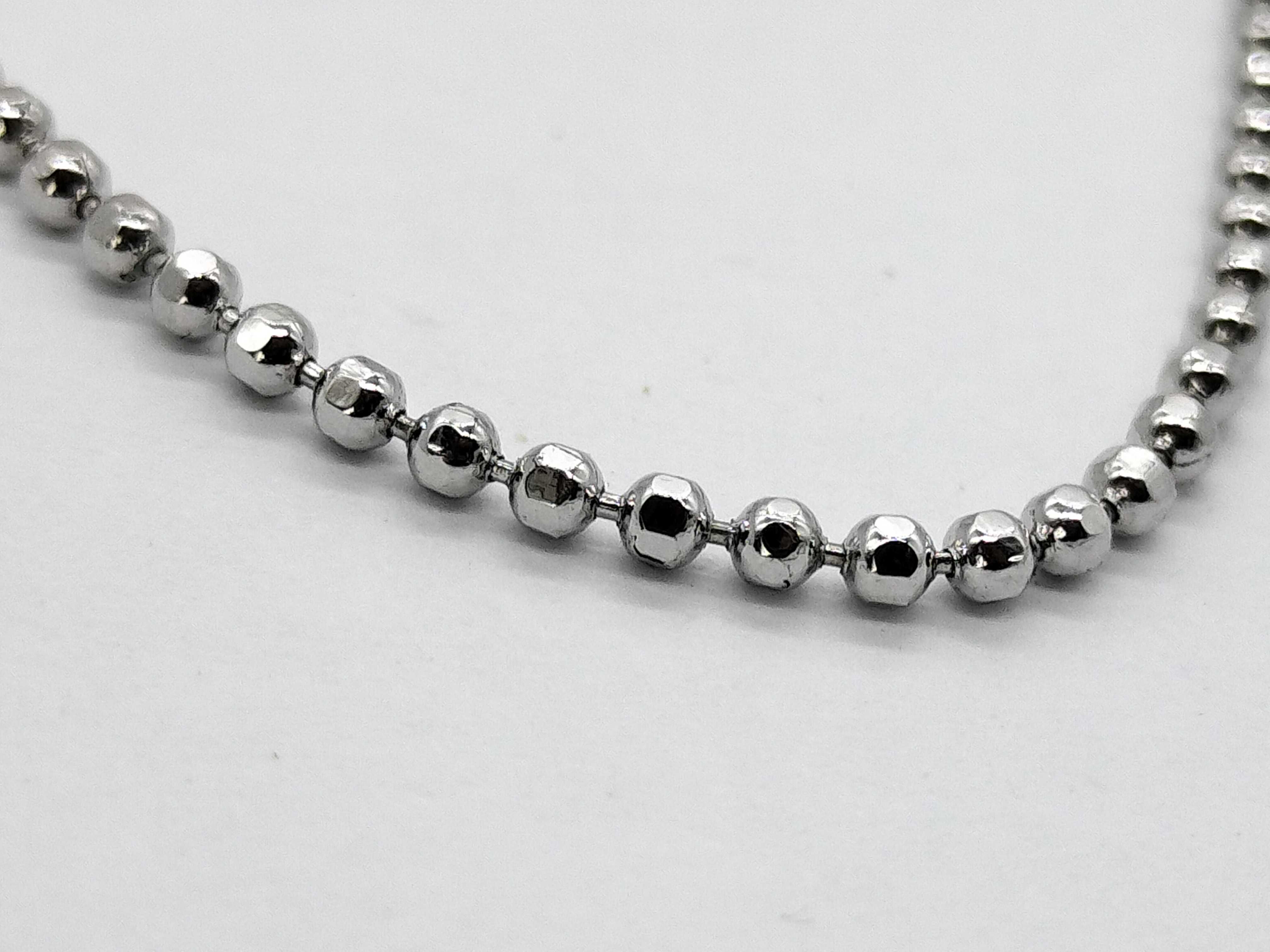 silver-colored necklace — view 2