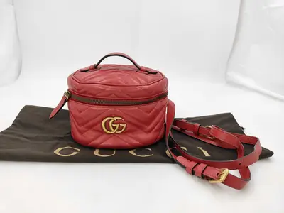 GG Marmont Quilted Backpack Vanity Bag