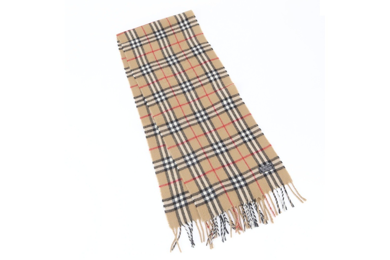 Nova Check scarf with tags attached.