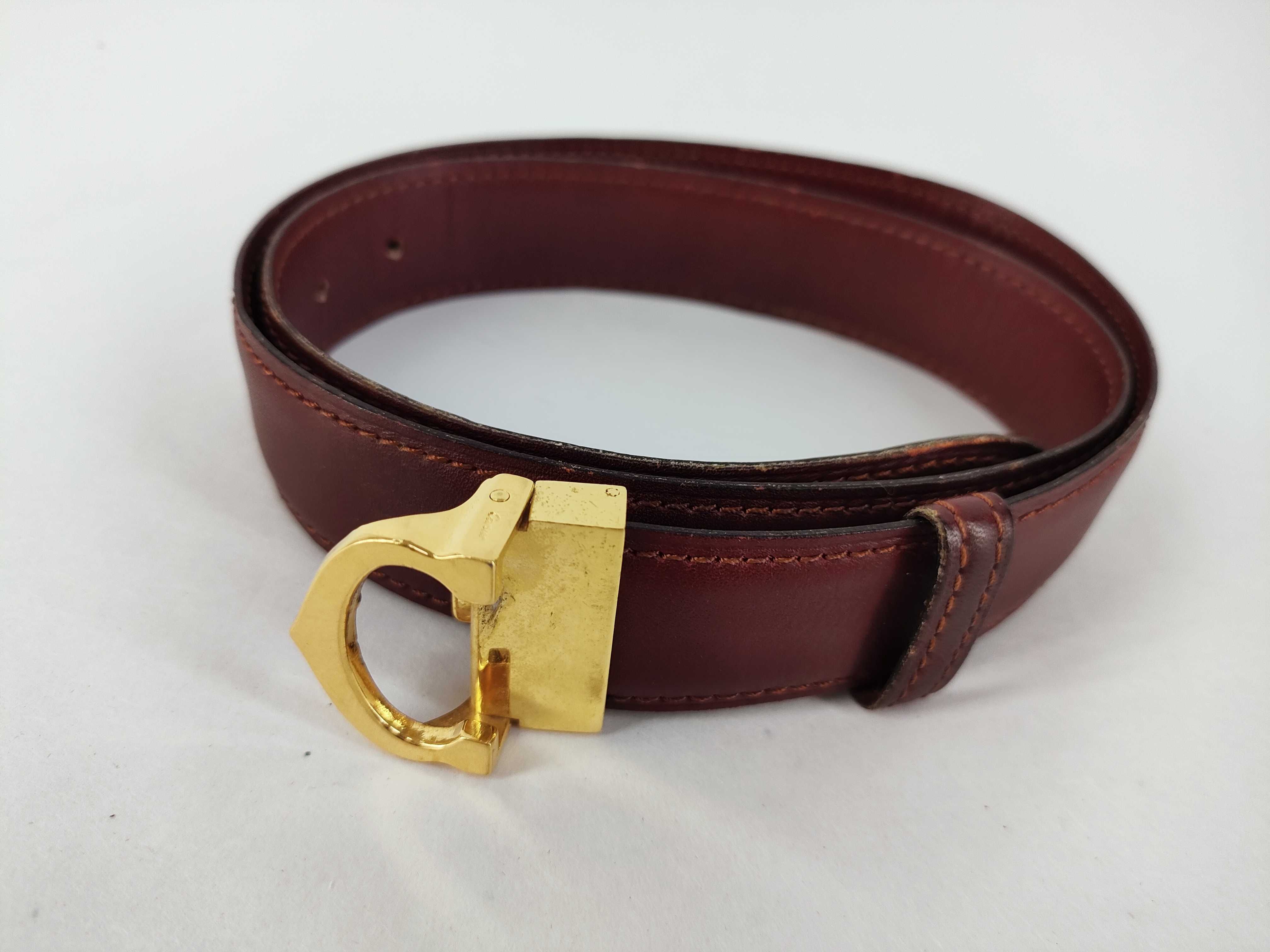 belt, calfskin, burgundy, gold hardware.