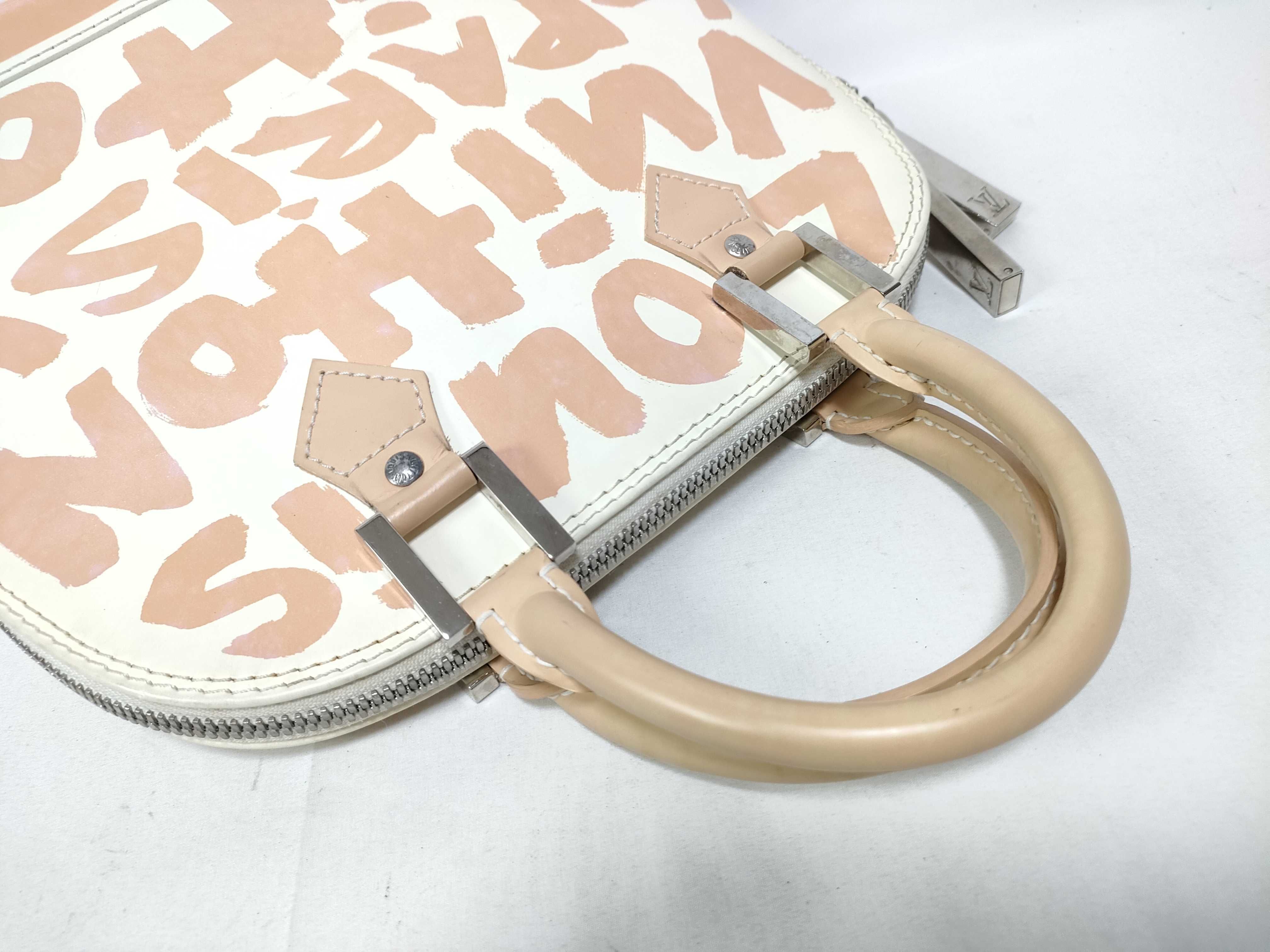 ID- Cow Skin Graffiti Alma MM M92180 white x orange BA0051 handbag — view 11
