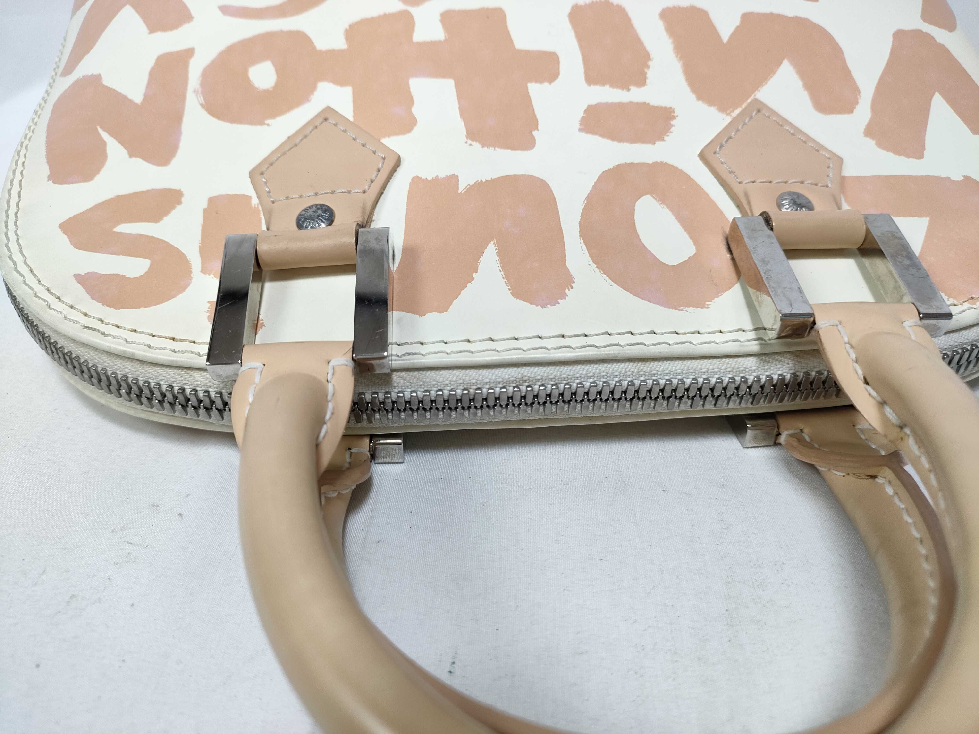 ID- Cow Skin Graffiti Alma MM M92180 white x orange BA0051 handbag — view 13
