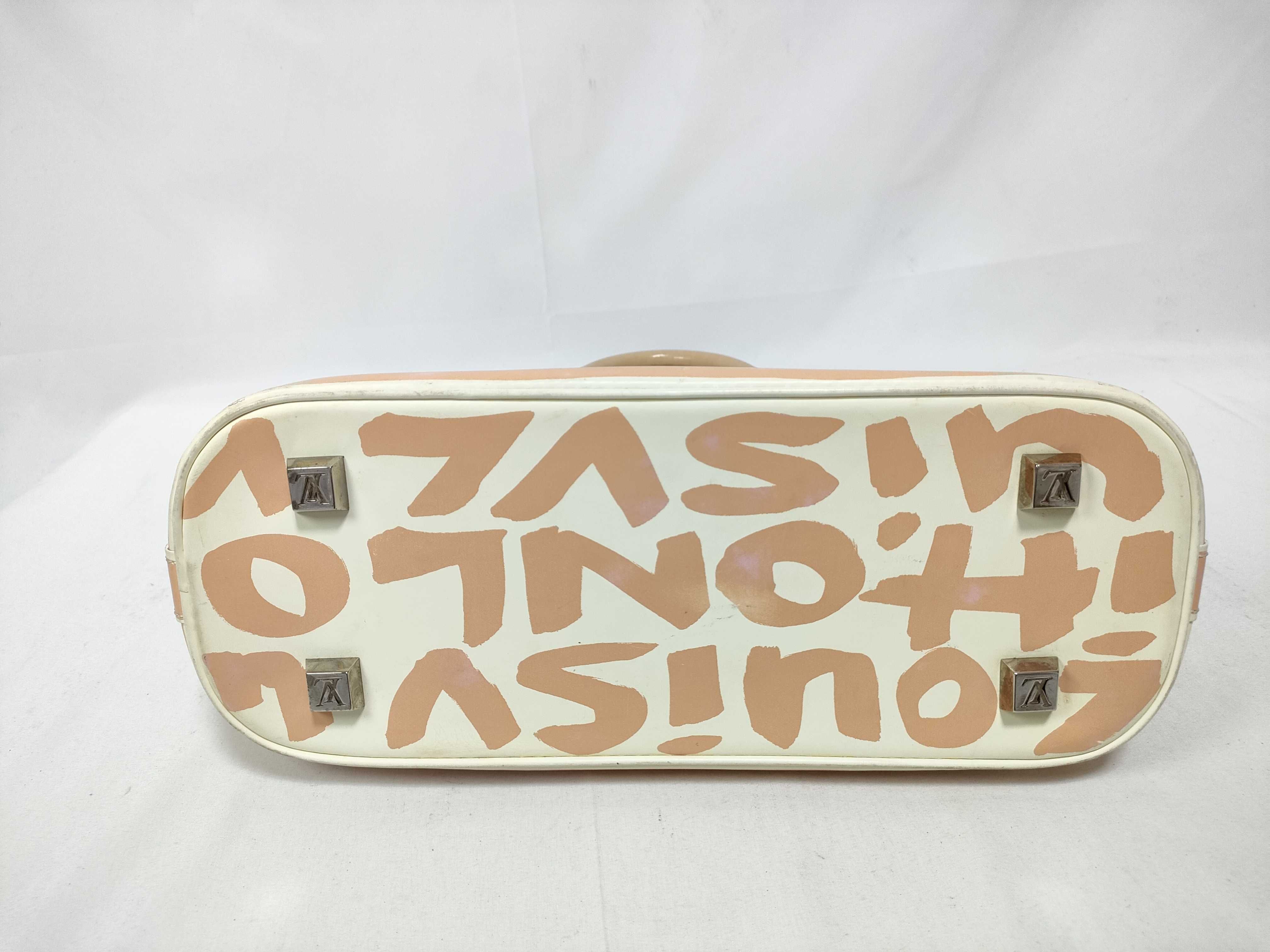 ID- Cow Skin Graffiti Alma MM M92180 white x orange BA0051 handbag — view 3
