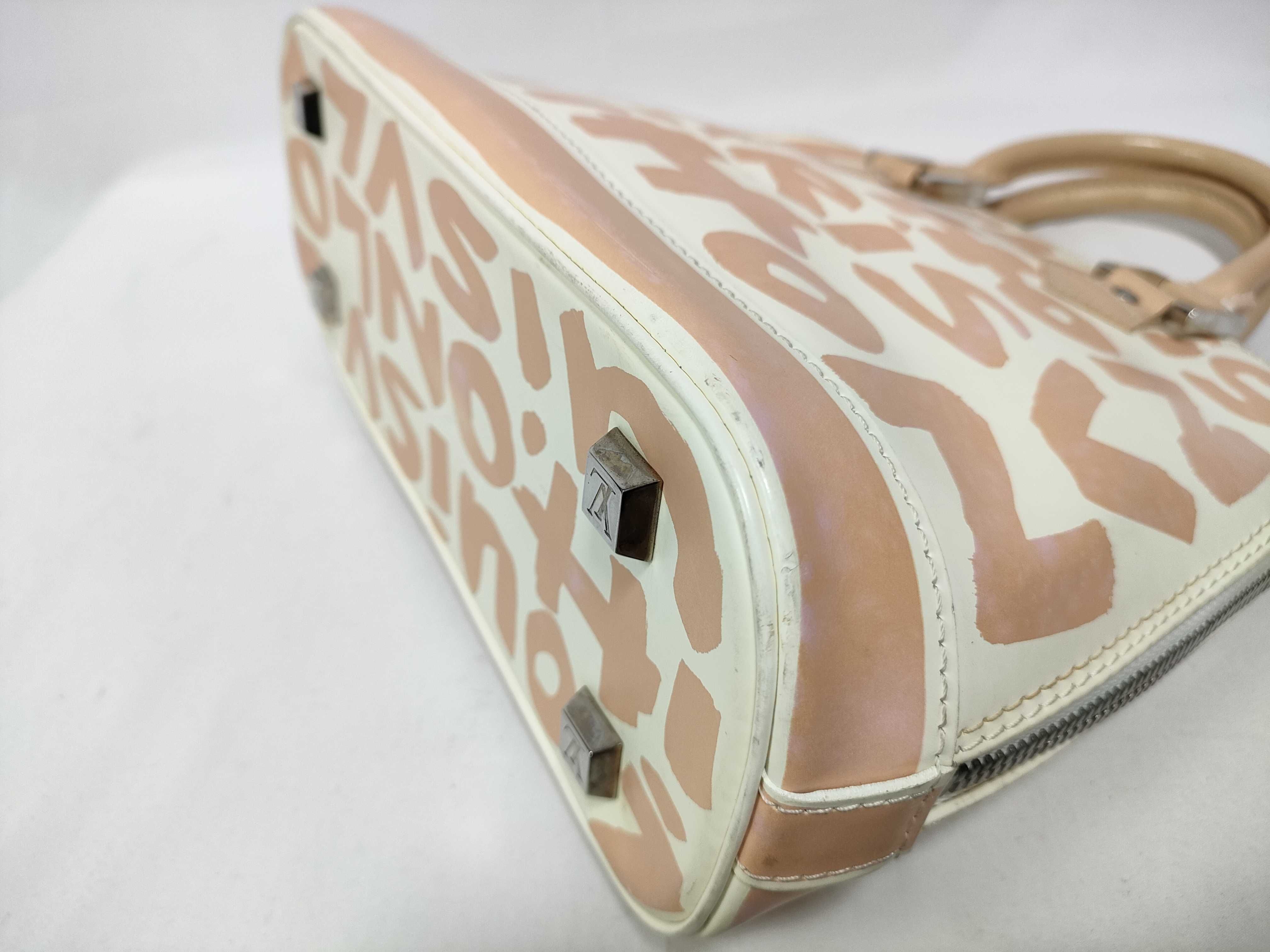 ID- Cow Skin Graffiti Alma MM M92180 white x orange BA0051 handbag — view 4