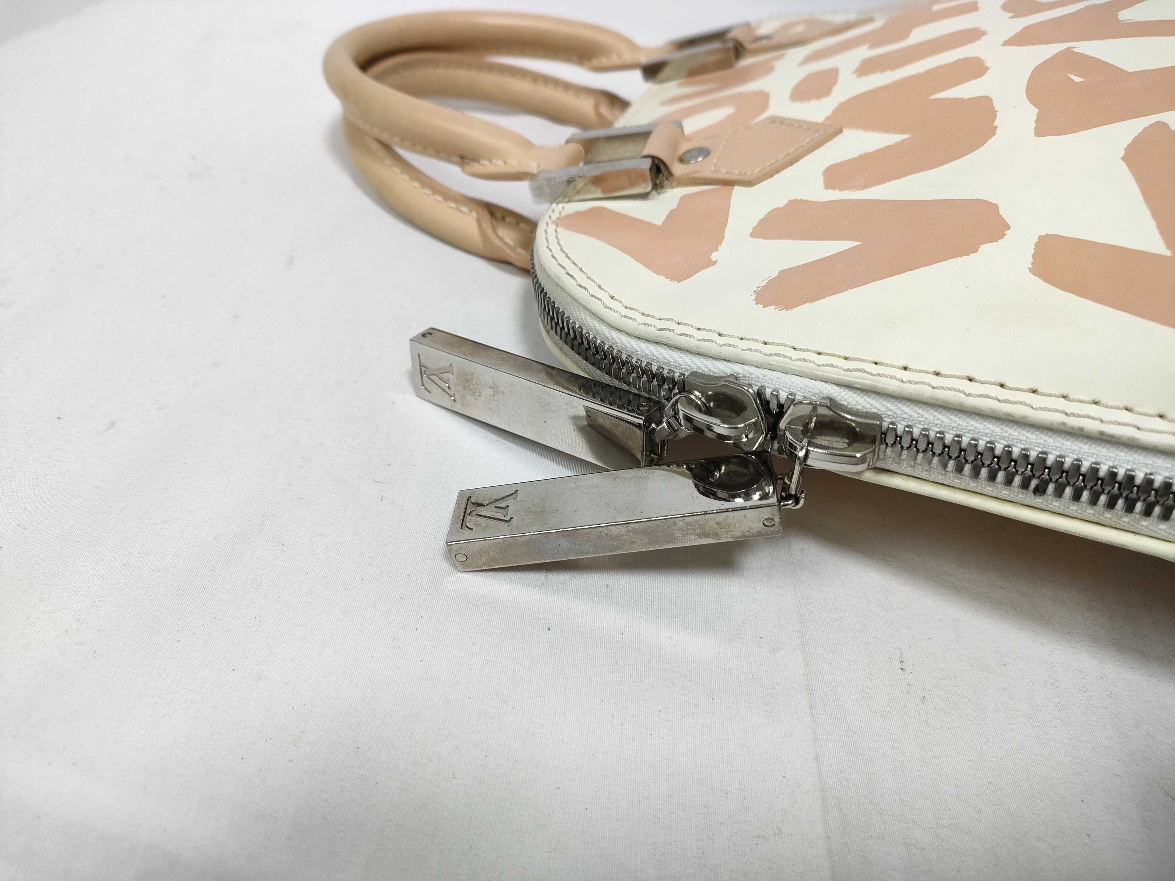 ID- Cow Skin Graffiti Alma MM M92180 white x orange BA0051 handbag — view 8
