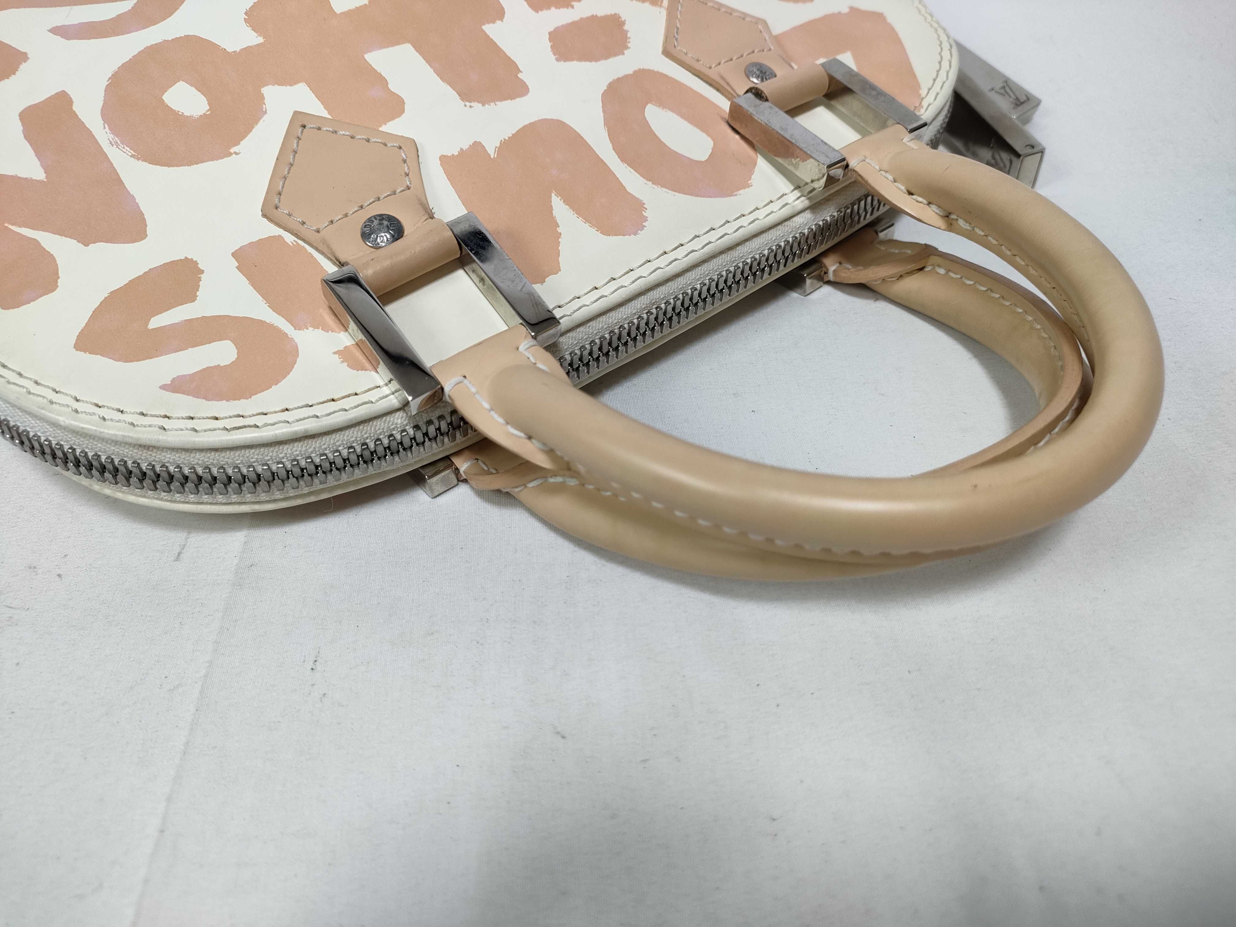 ID- Cow Skin Graffiti Alma MM M92180 white x orange BA0051 handbag — view 10