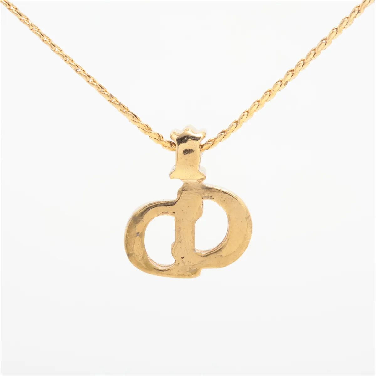 CD logo necklace, gold plated with rhinestones. Shows signs of wear, — view 2