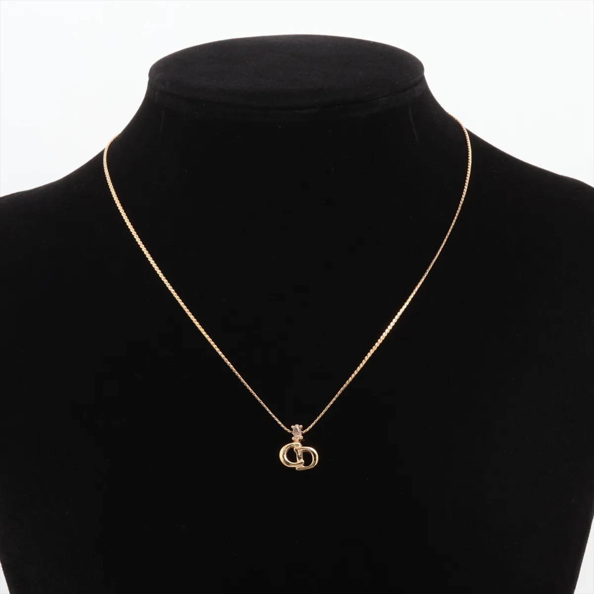 CD logo necklace, gold plated with rhinestones. Shows signs of wear, — view 5