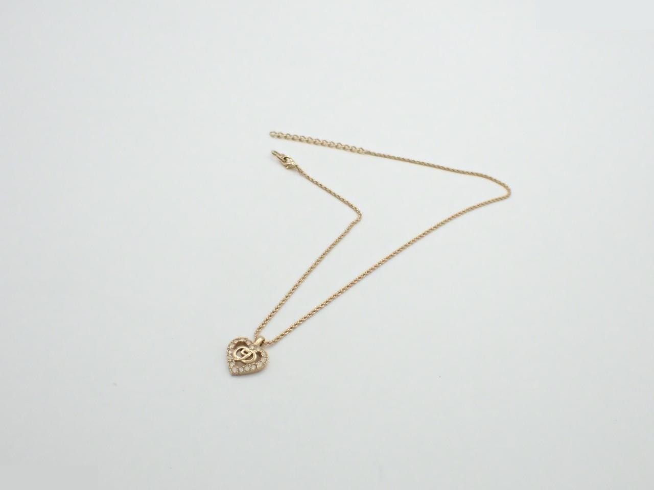 Gold necklace with stone, chain approximately 42cm long. — view 3