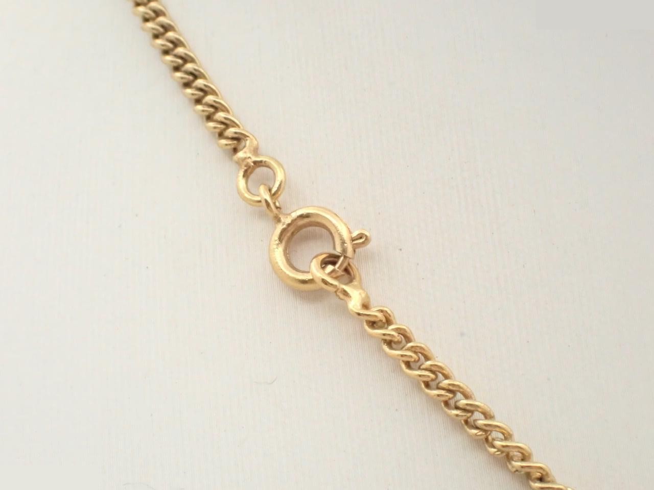 Gold necklace with a bag motif and approximately 42cm chain. — view 2