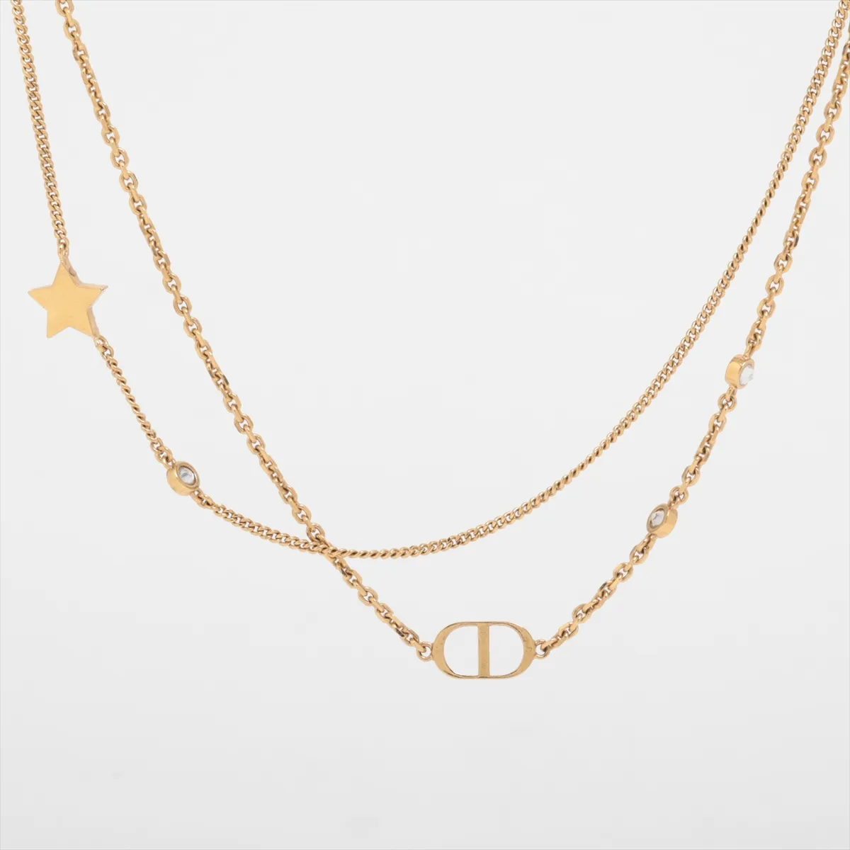 Petit CD necklace, gold plated with rhinestones. Shows signs of wear including dents, — view 2