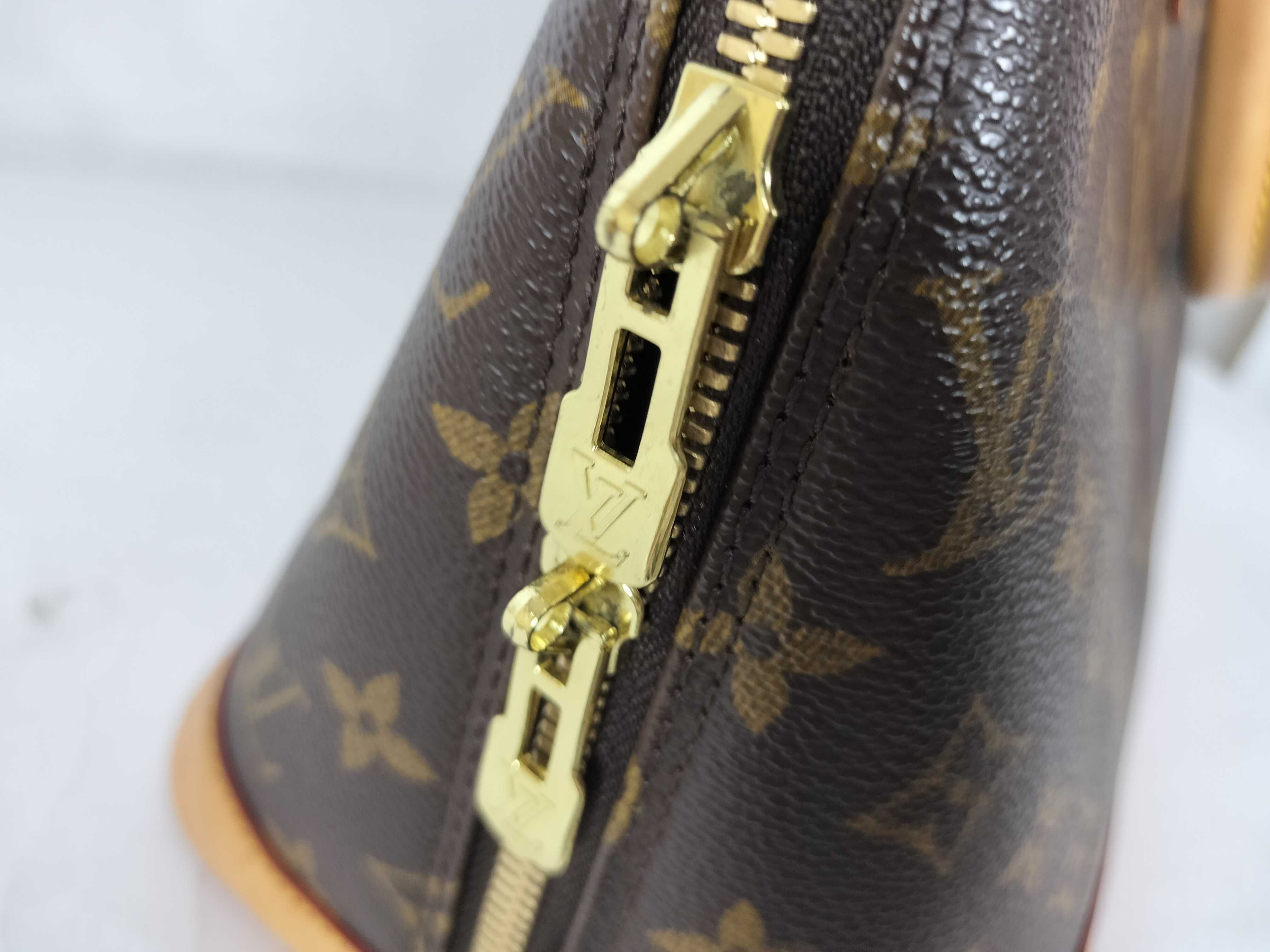 Monogram Alma 30 Handbag — view 8