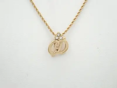 Gold necklace with stone, chain approximately 42cm long.