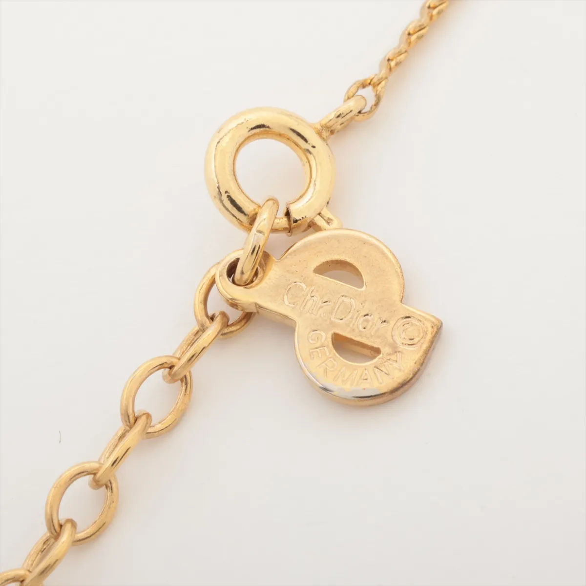 CD logo necklace, gold plated with rhinestones. Shows signs of wear, — view 4