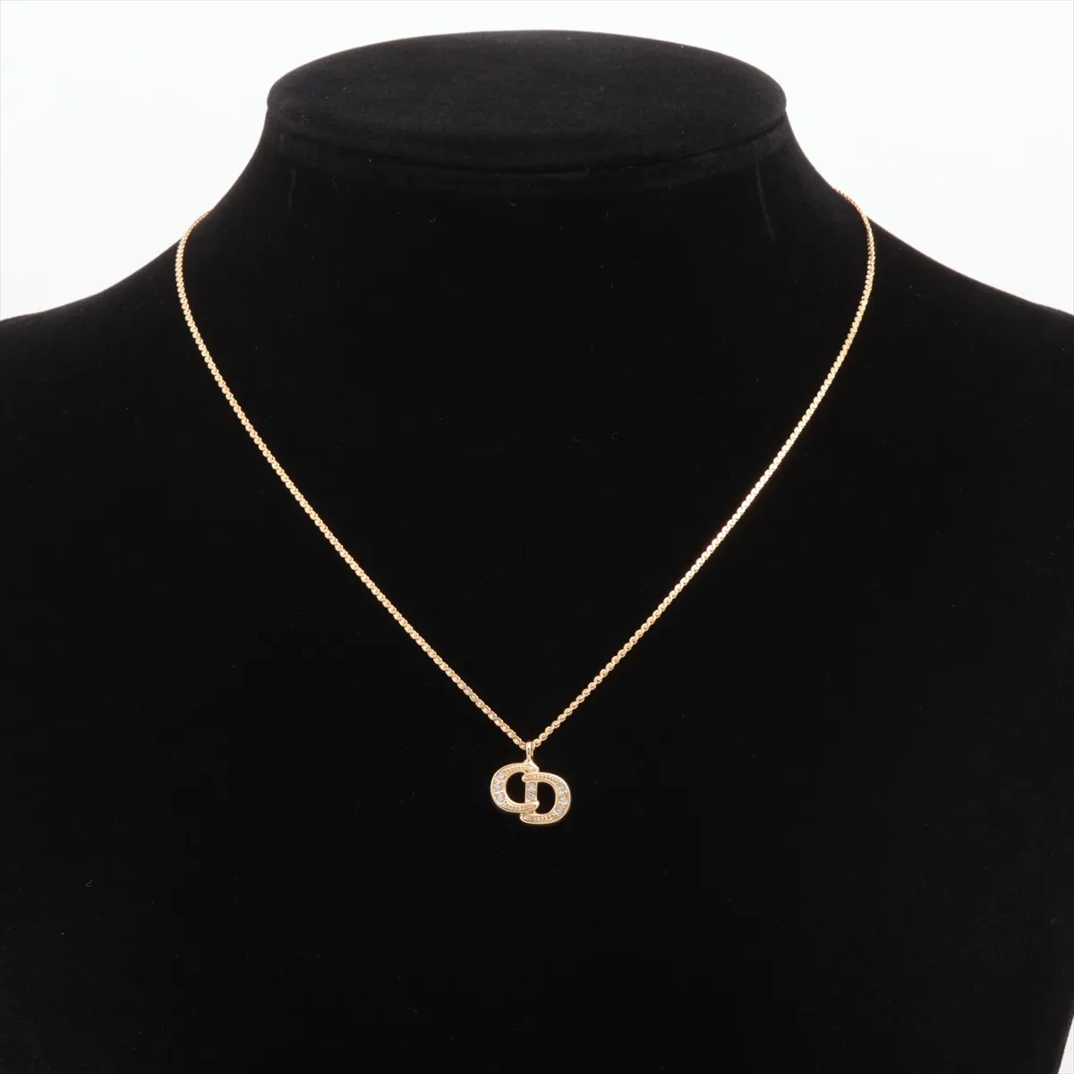 CD logo necklace, gold plated with rhinestones. Shows signs of wear, — view 5