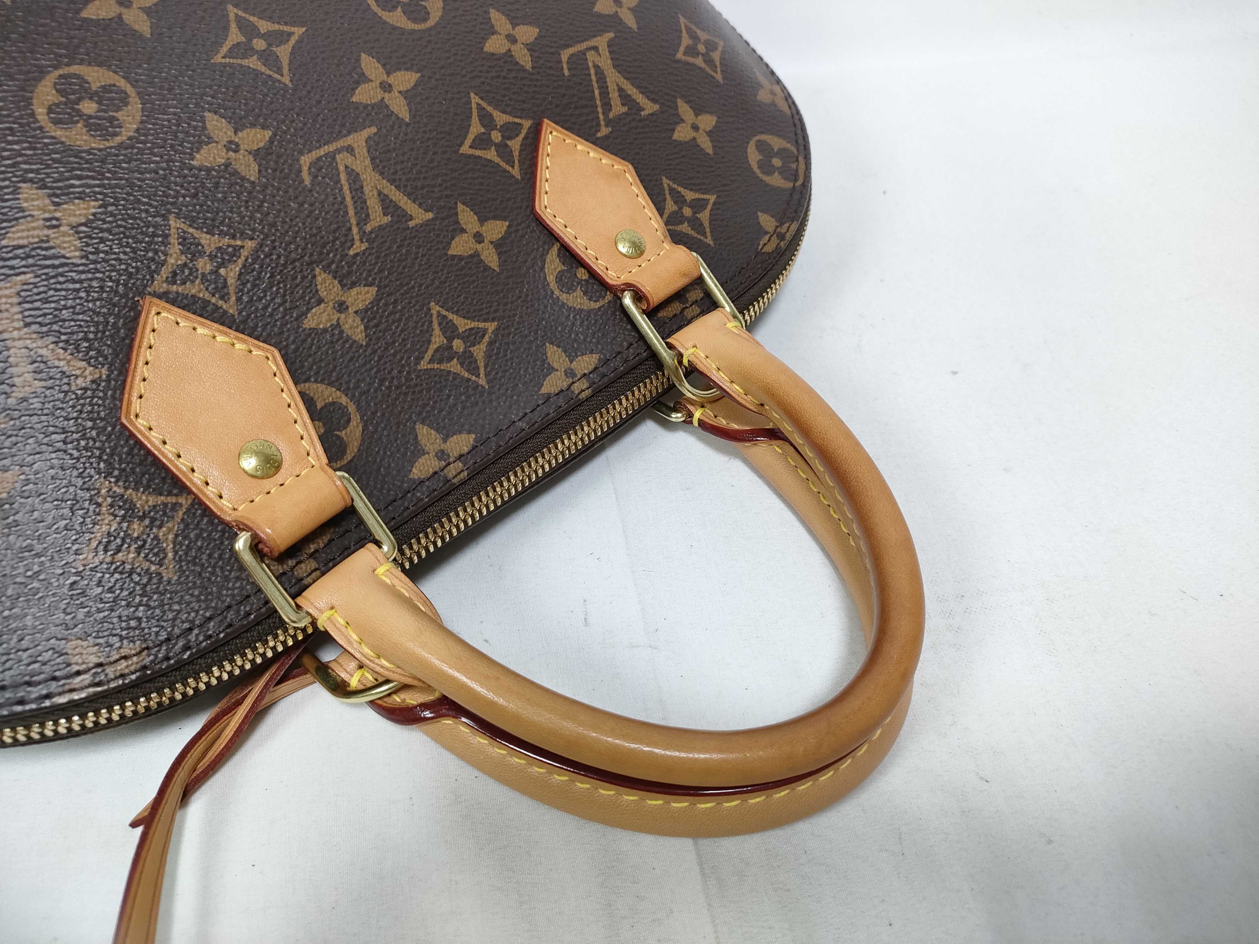 Monogram Louis Vuitton Monogram Handbag Alma PM M51130 Handbag — view 9