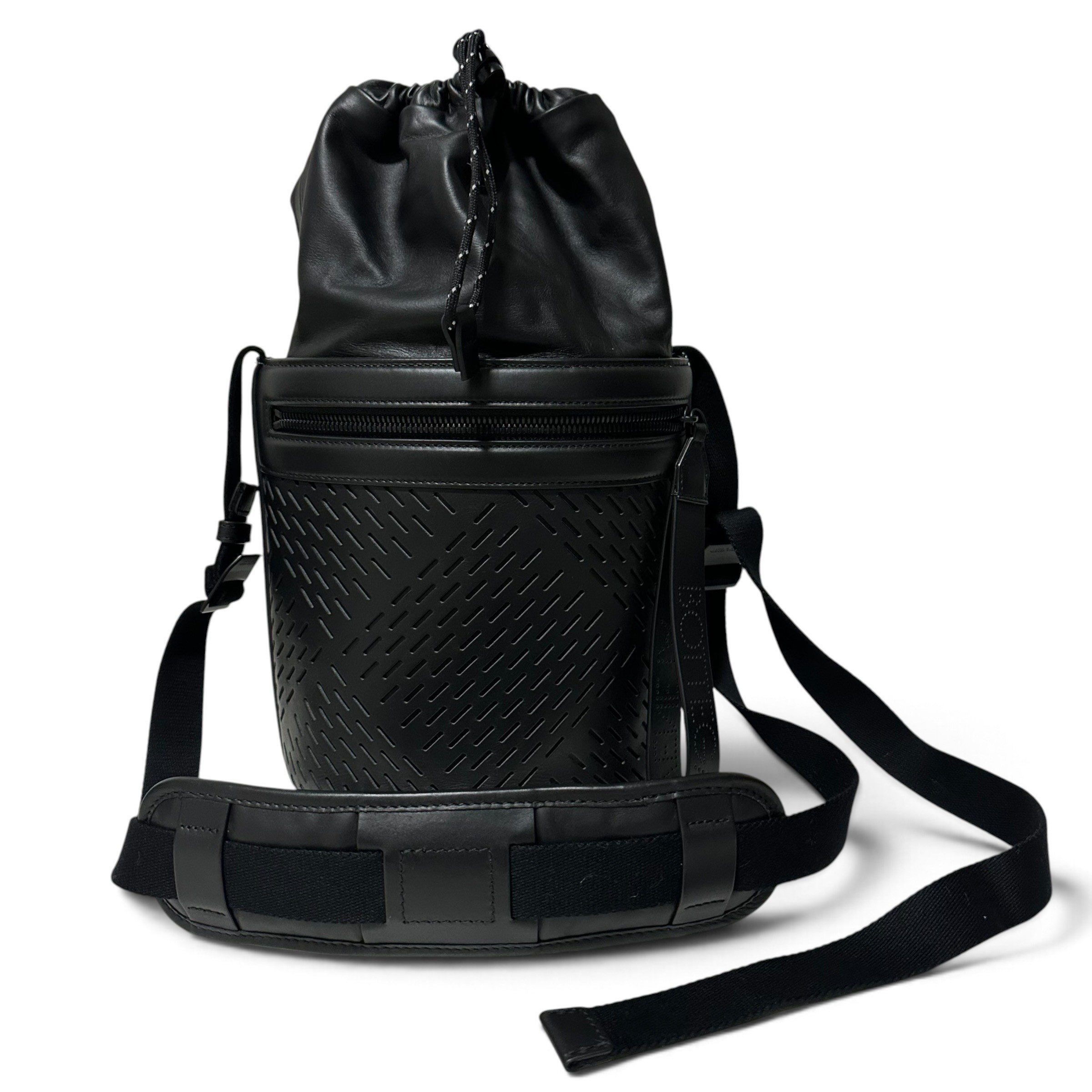 Shoulder bag, perforated paper, drawstring bucket bag
