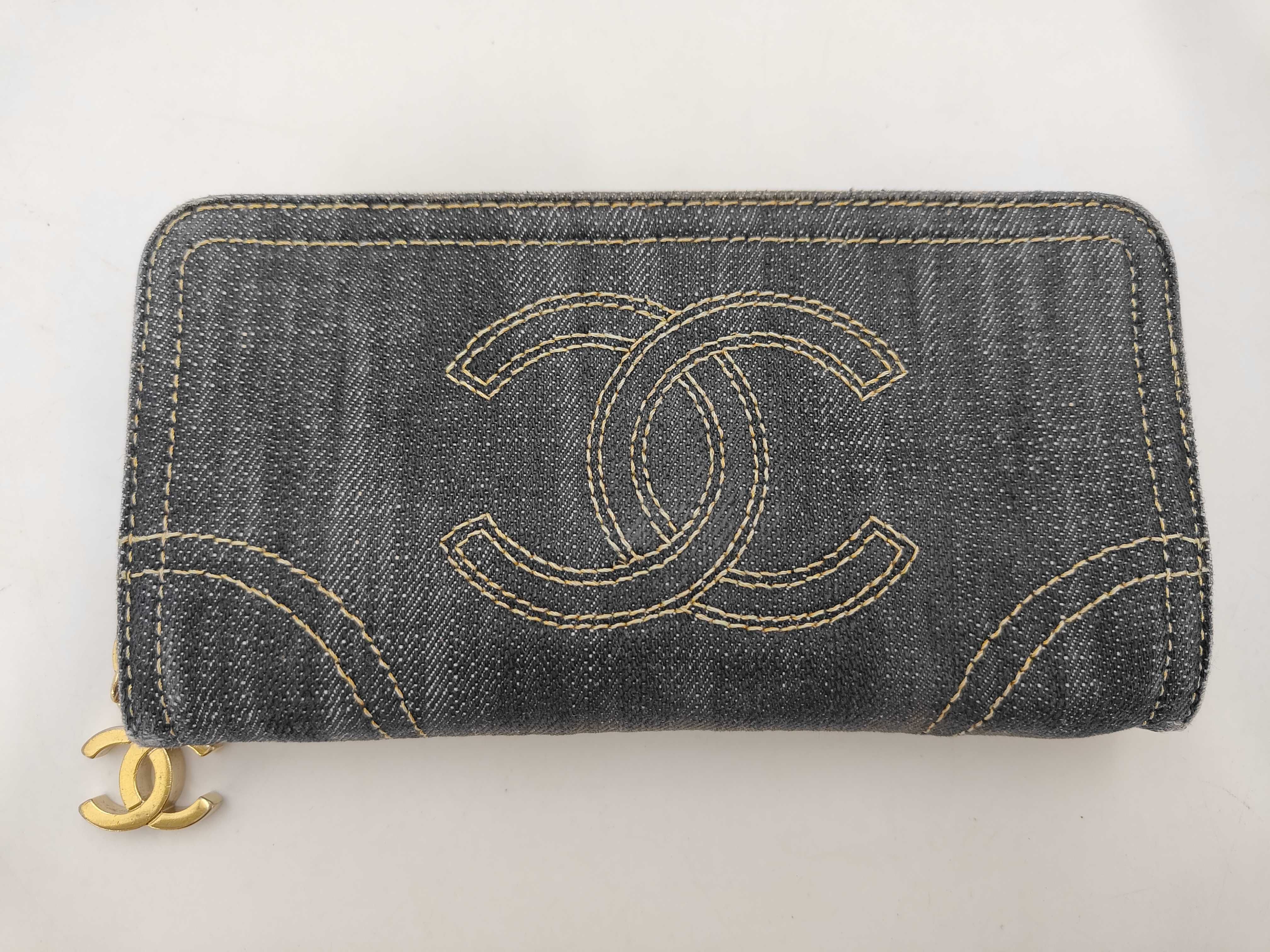 denim long wallet, serial number in the teens, with sticker.
