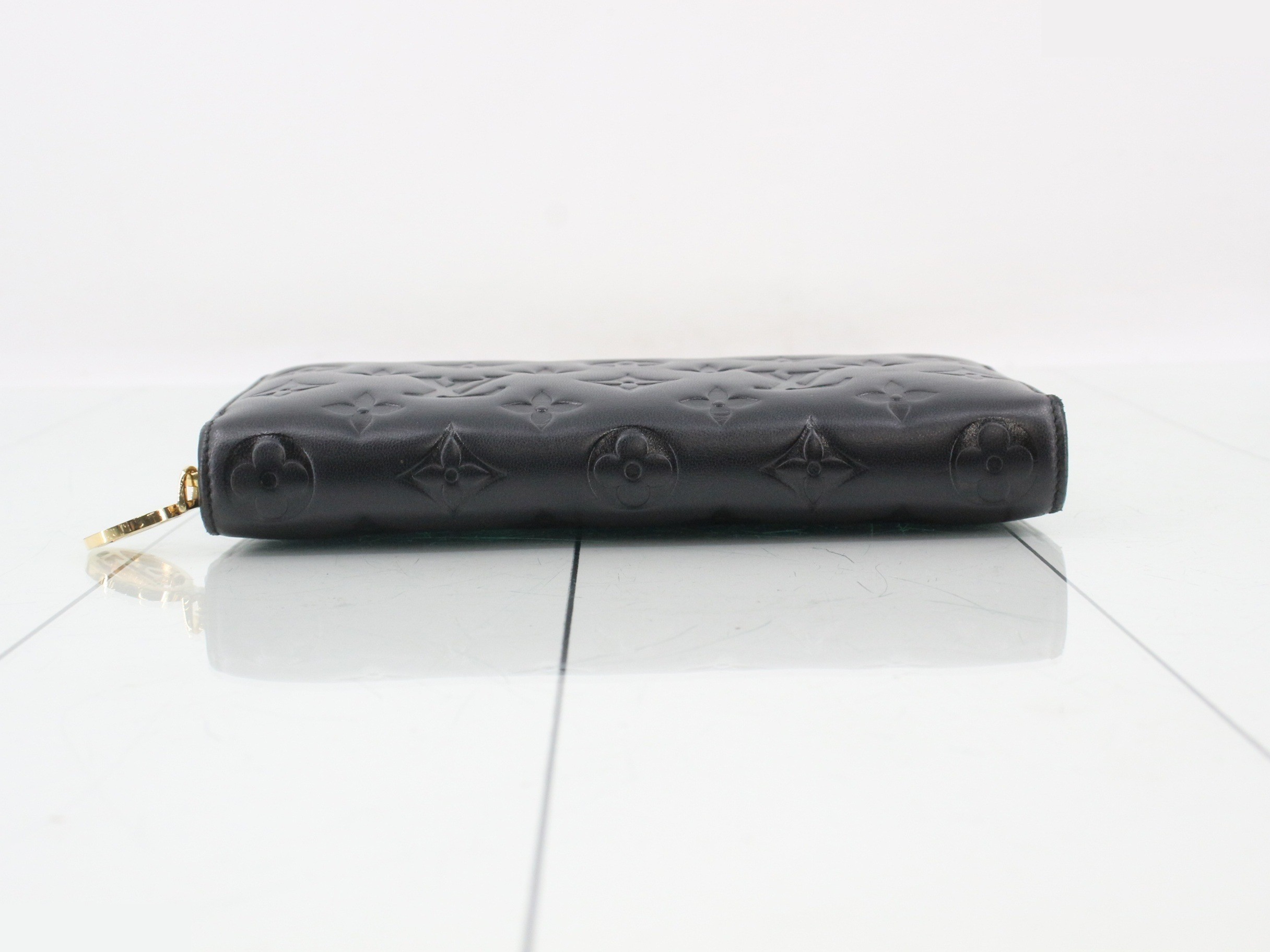 LV Monogram Embossed Zippy Wallet — view 3