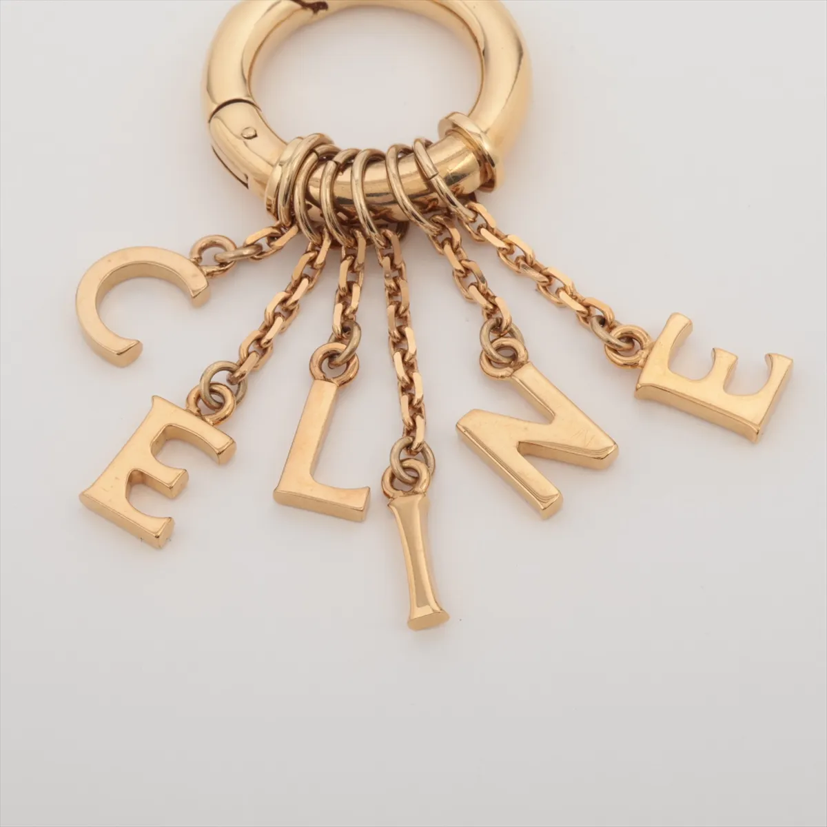 logo charm, GP gold. Shows signs of wear, — view 3